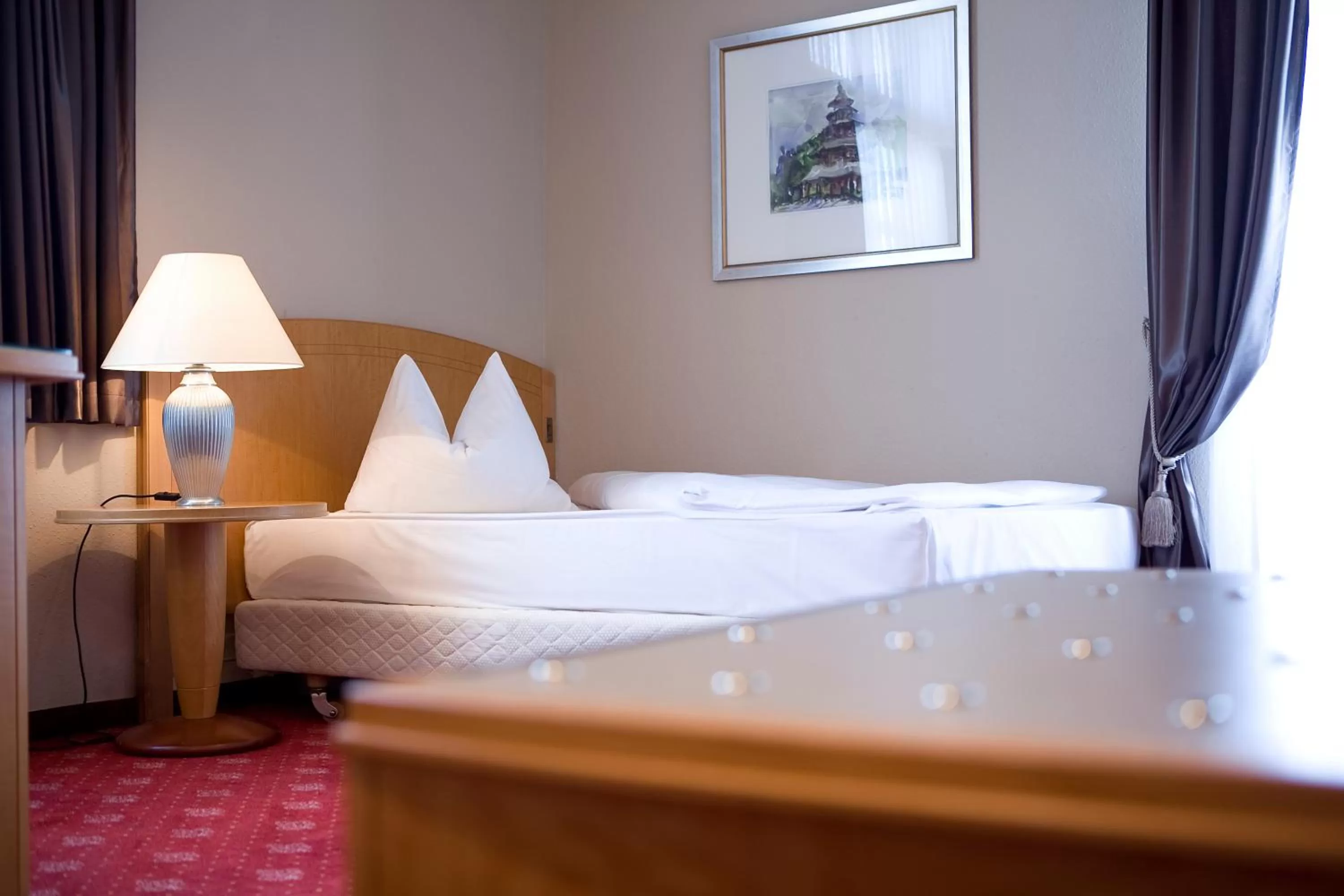 Bed in Hotel Das Kleine Ritz