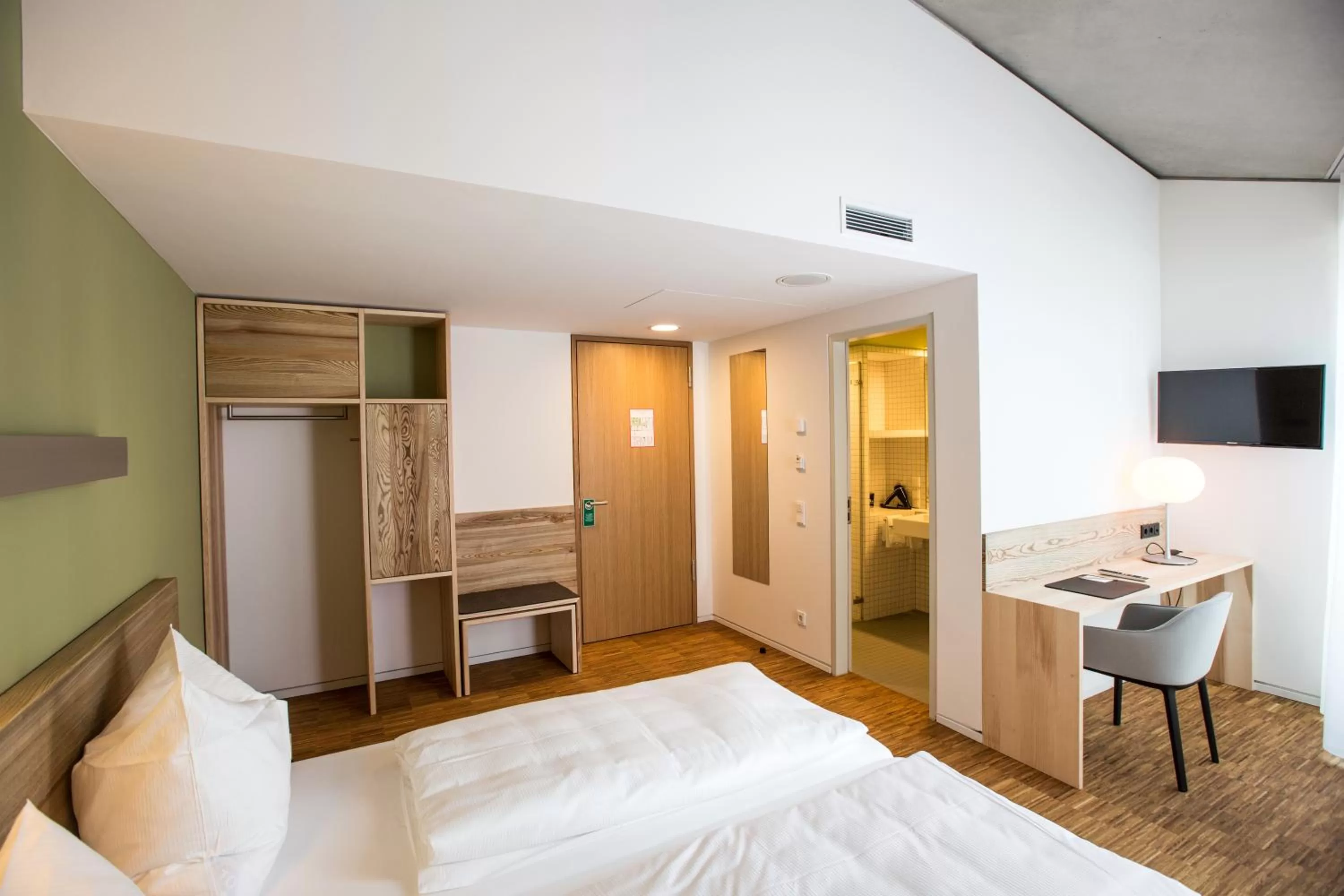 Photo of the whole room, Bed in Green City Hotel Vauban