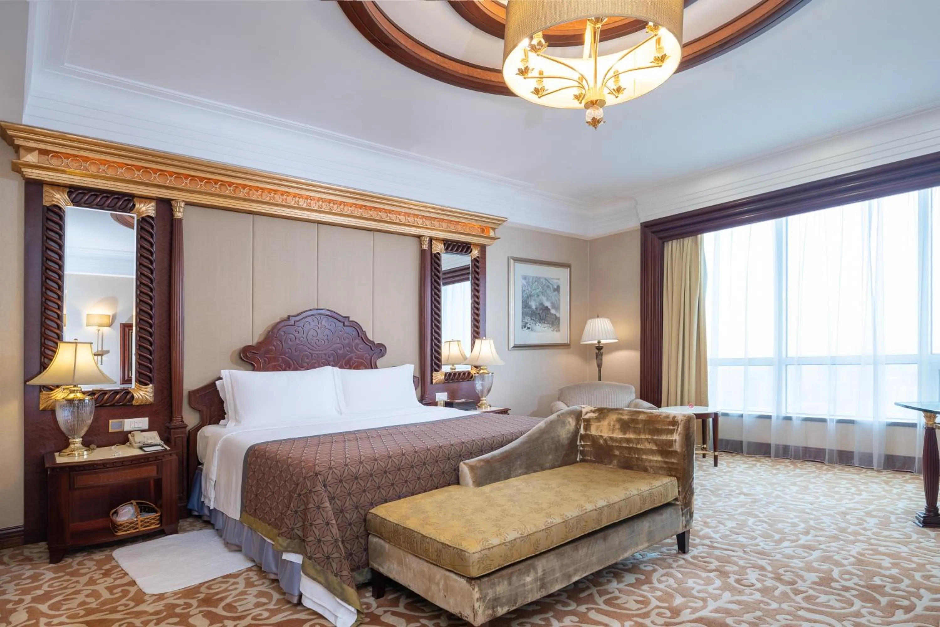 Bed in Regal Palace Hotel