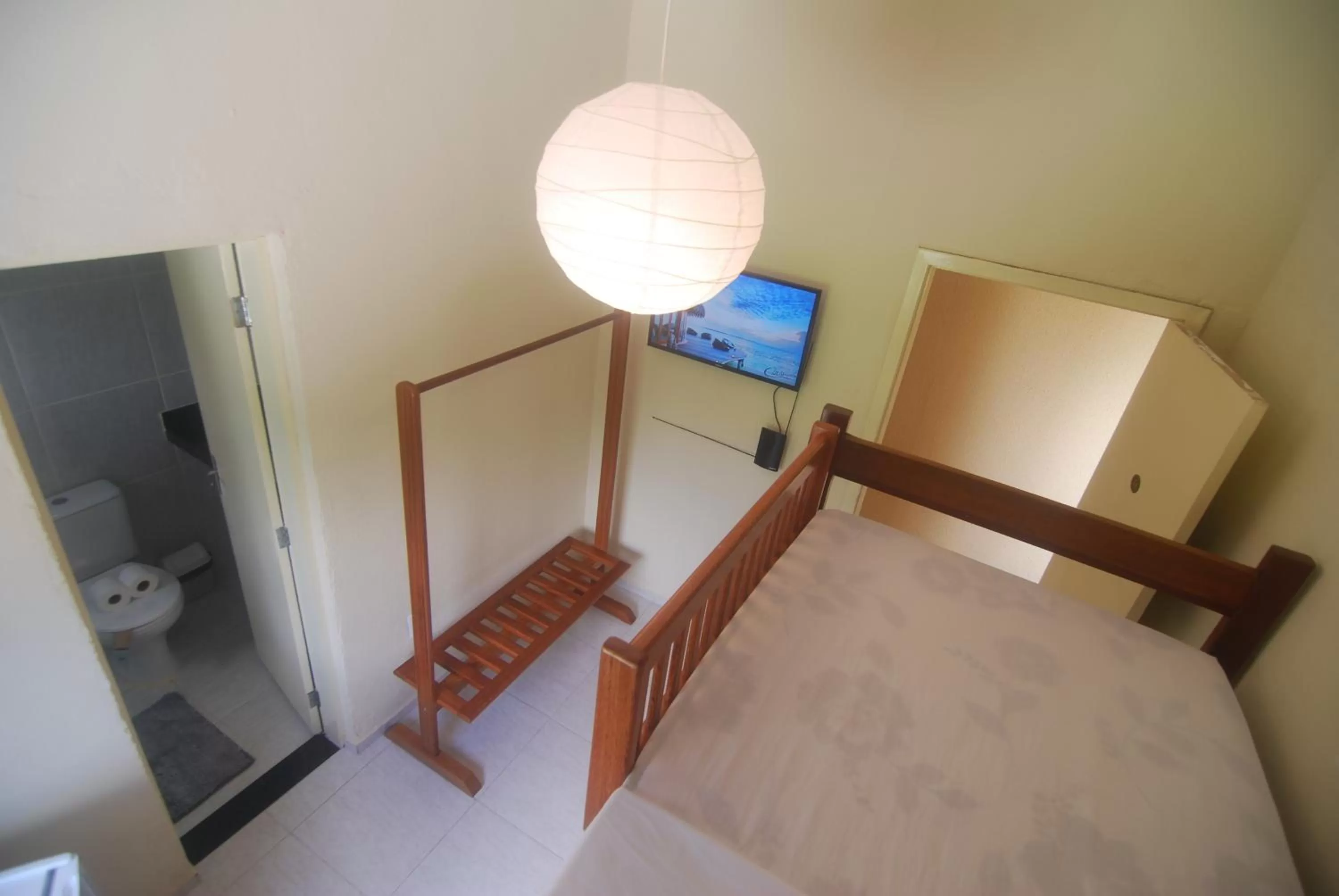 Bed, TV/Entertainment Center in Refúgio Pousada Fortaleza