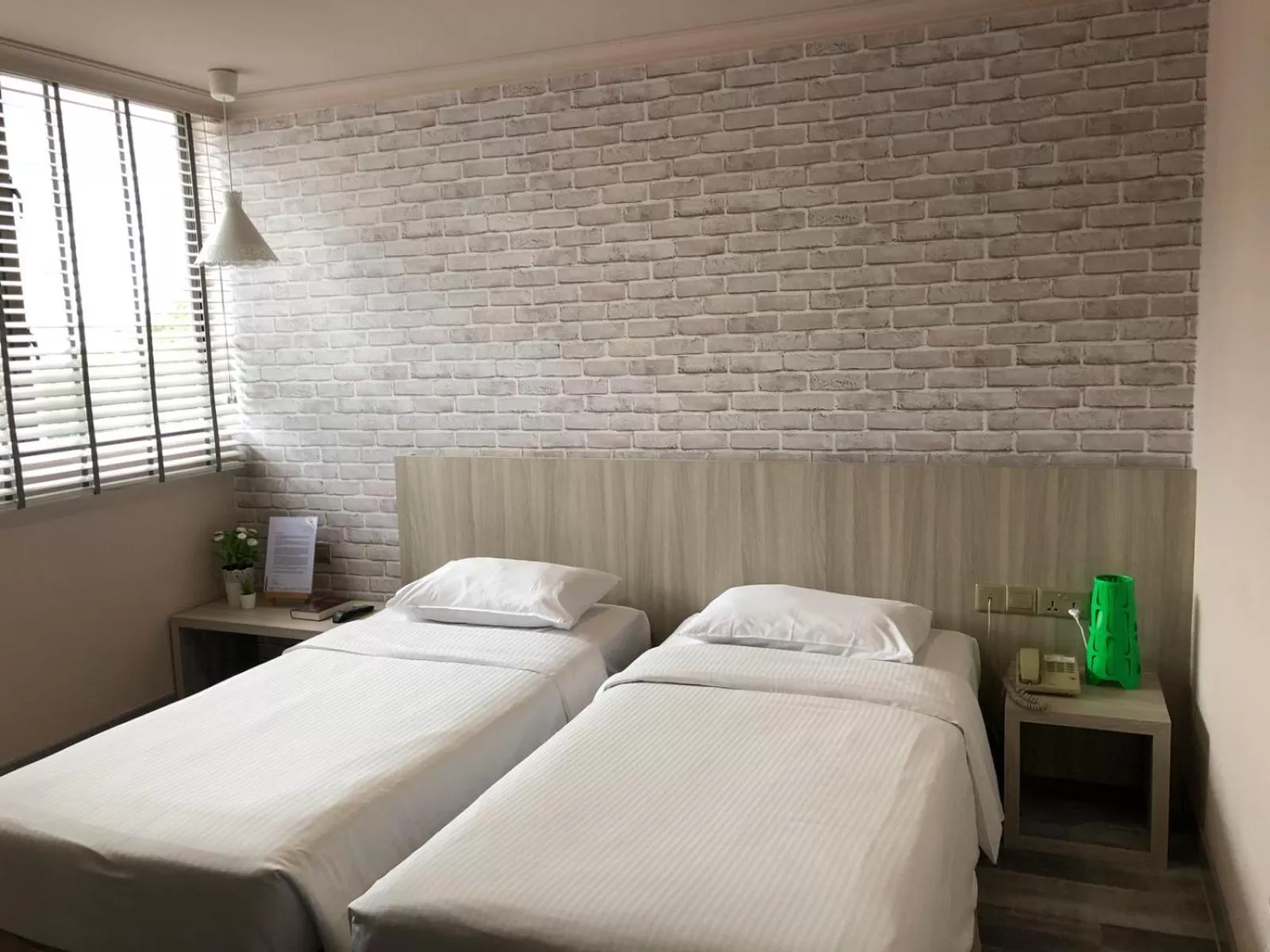 Bed in YMCA One Orchard