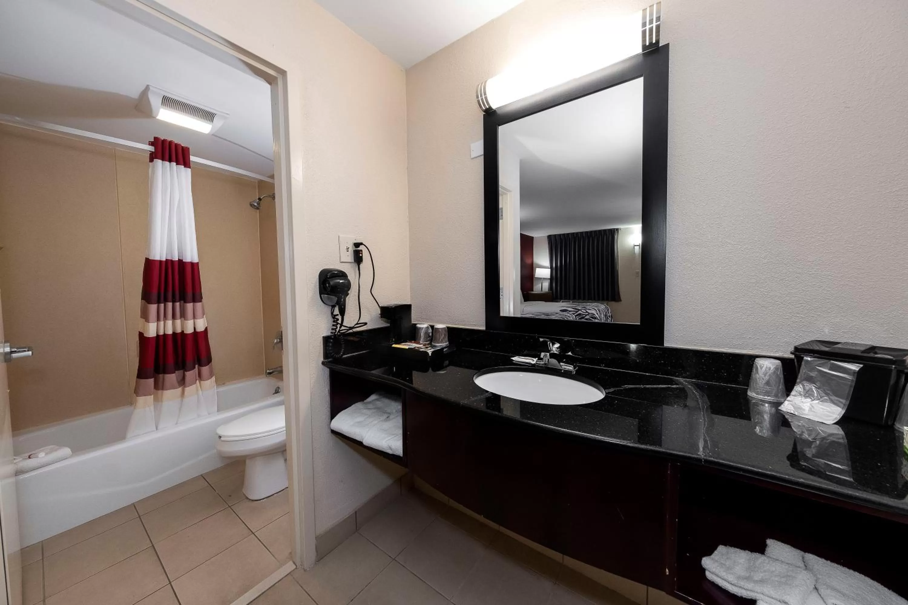Bathroom in HomeTowne Studios by Red Roof Bordentown - McGuire AFB