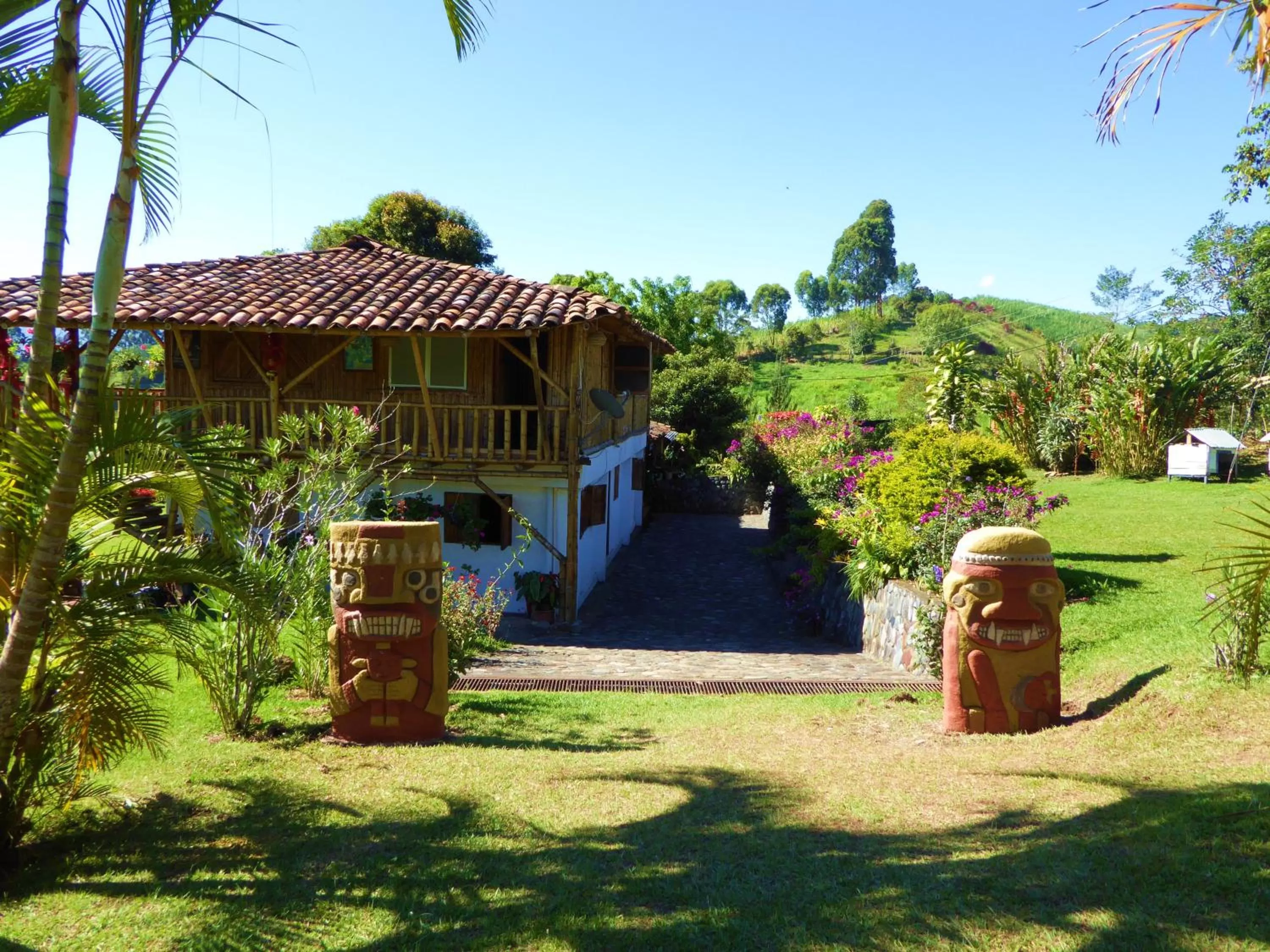 Facade/entrance, Garden in Finca El Cielo