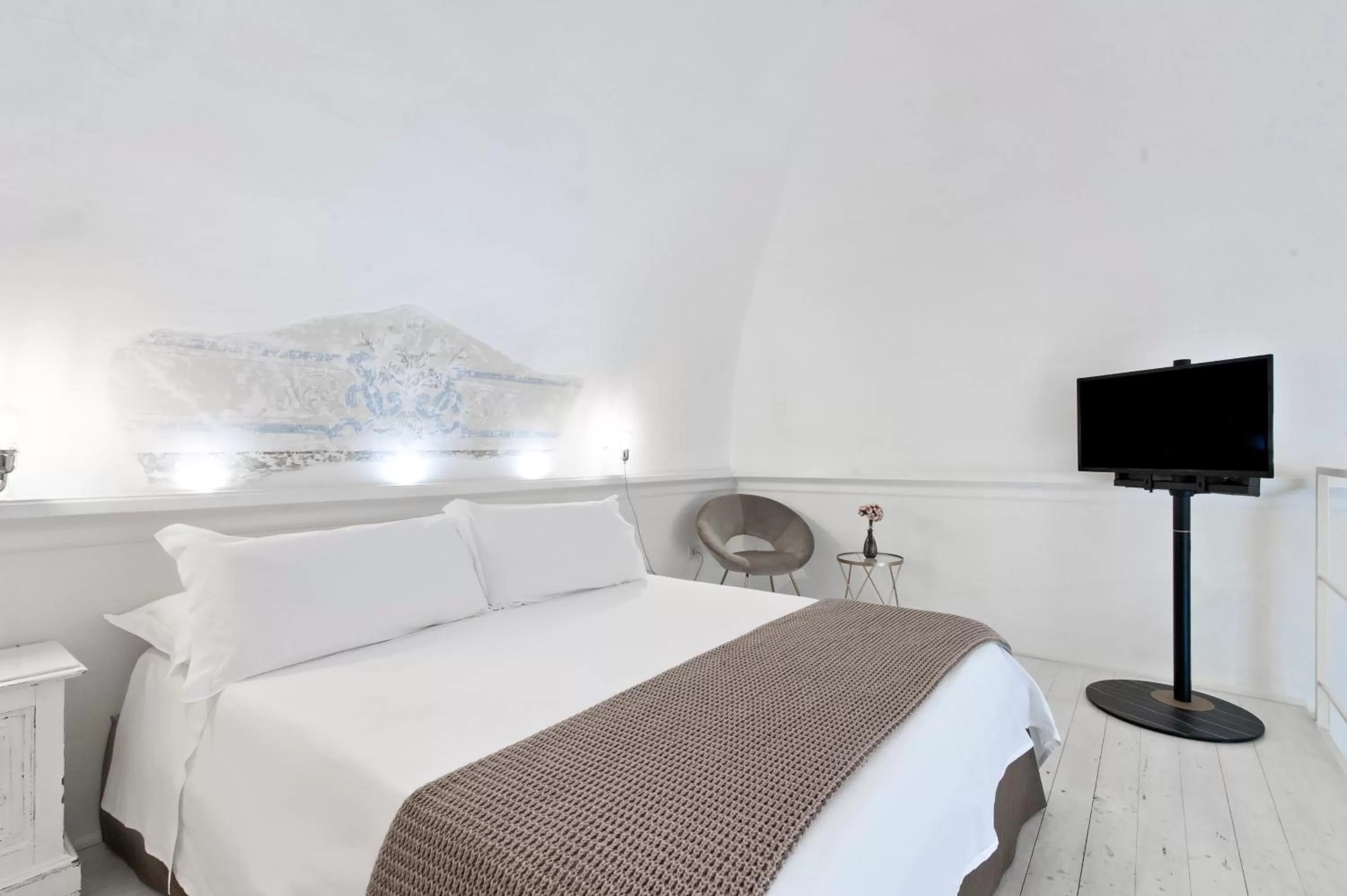 Bed in Casa di Lo Suites