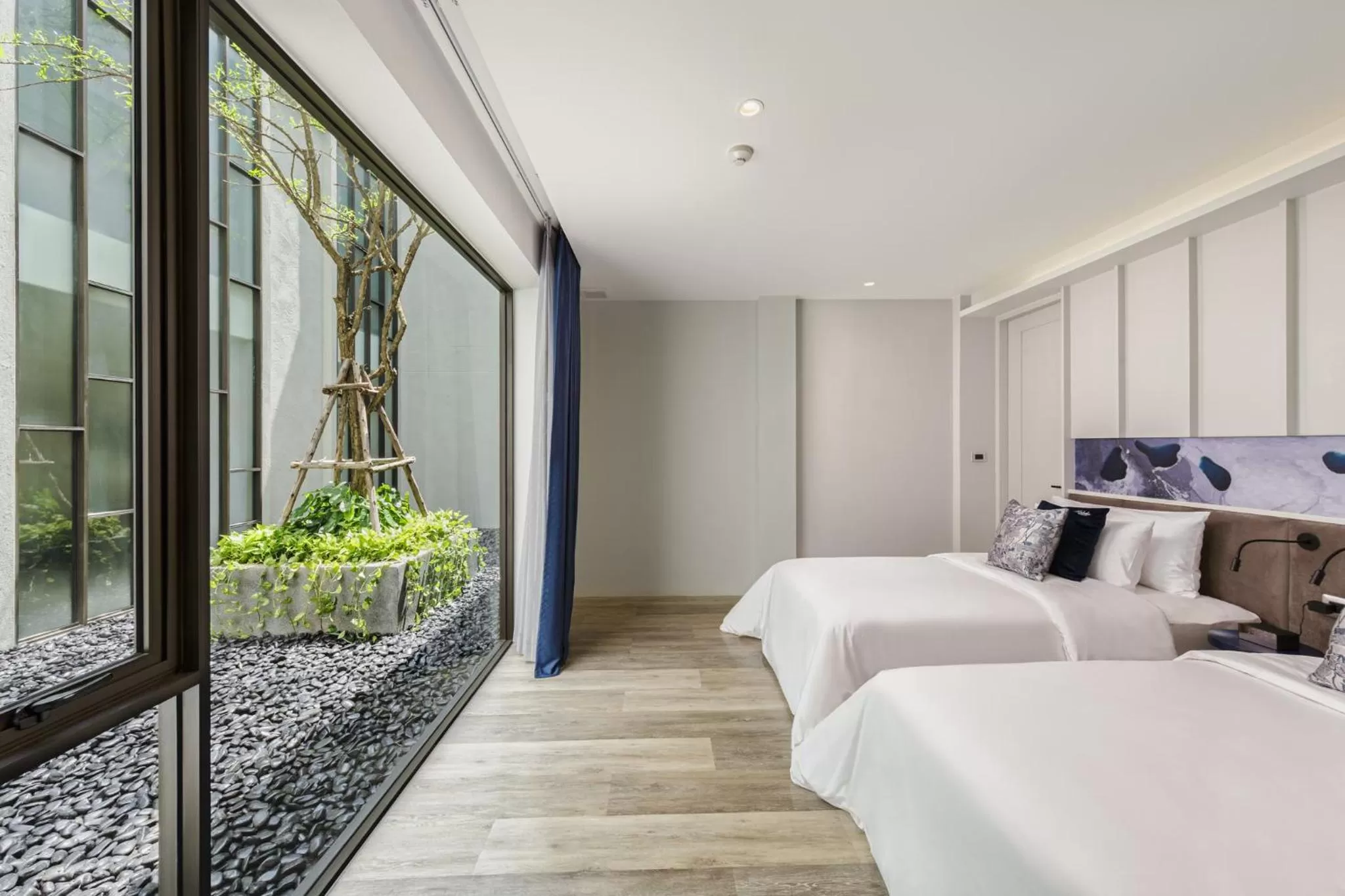 Bed in Maladee Rendezvous Hotel Chiang Mai