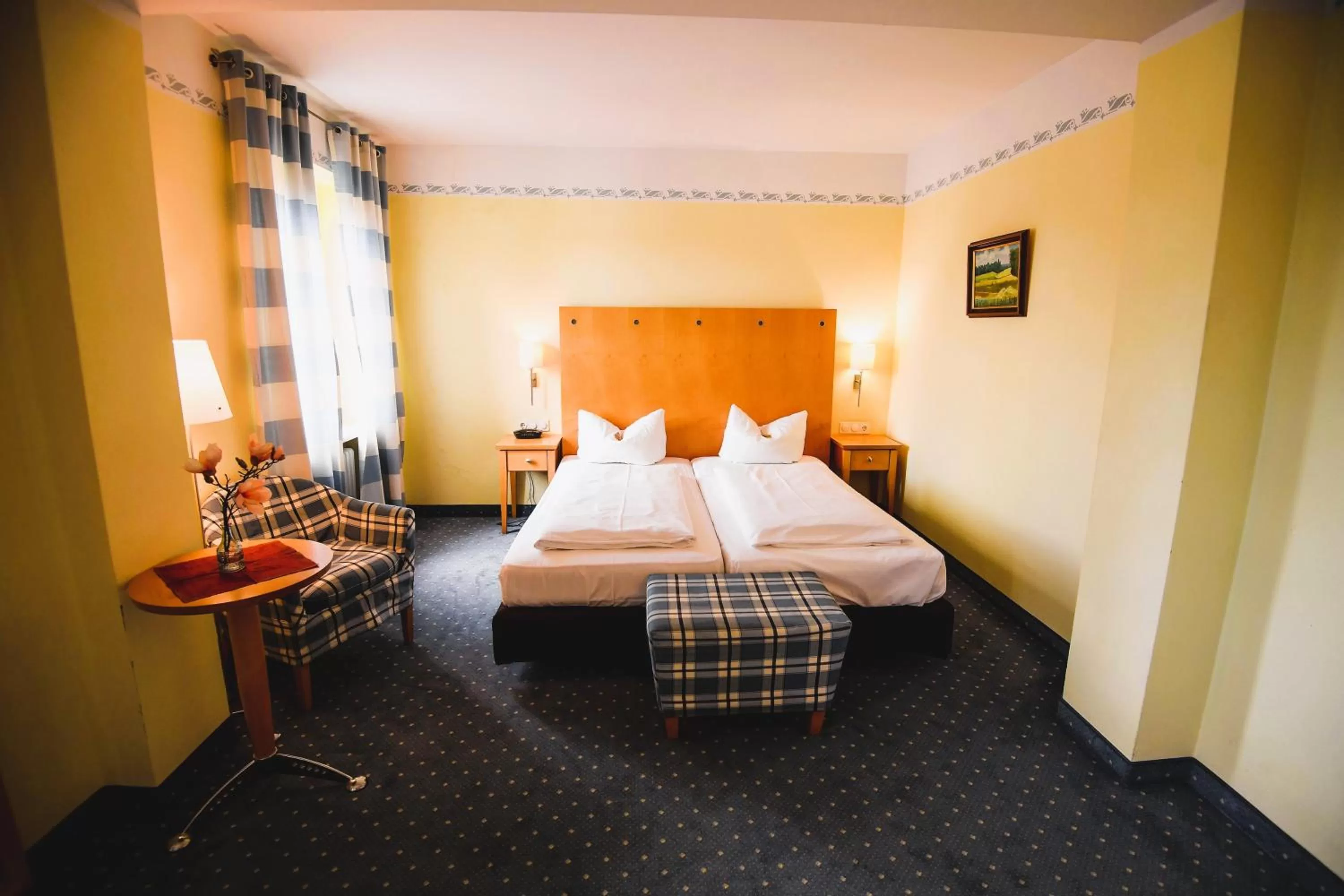 Bed in Hotel Rosenheimer Hof