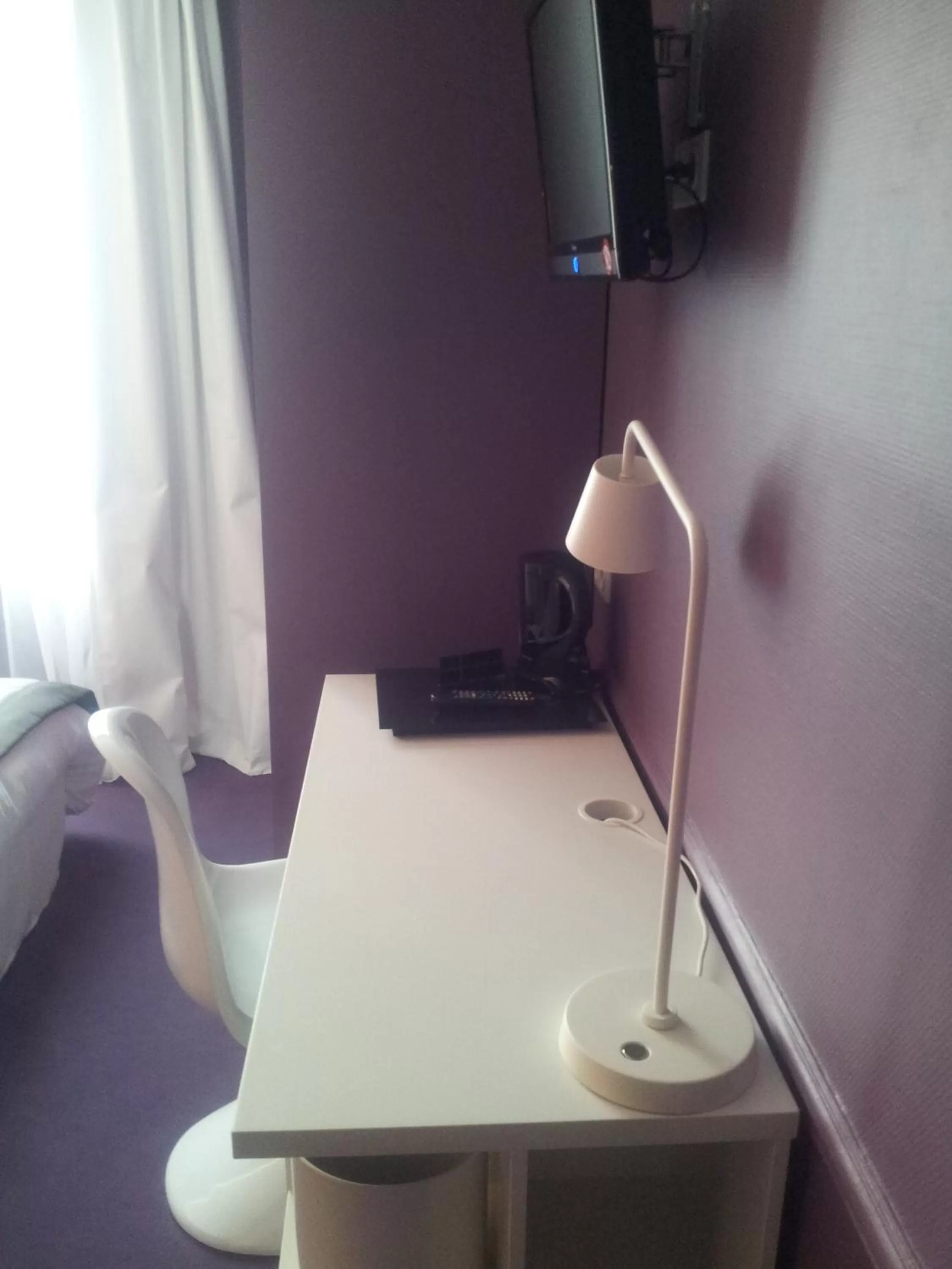 Seating area in Hôtel Cecyl Reims Centre