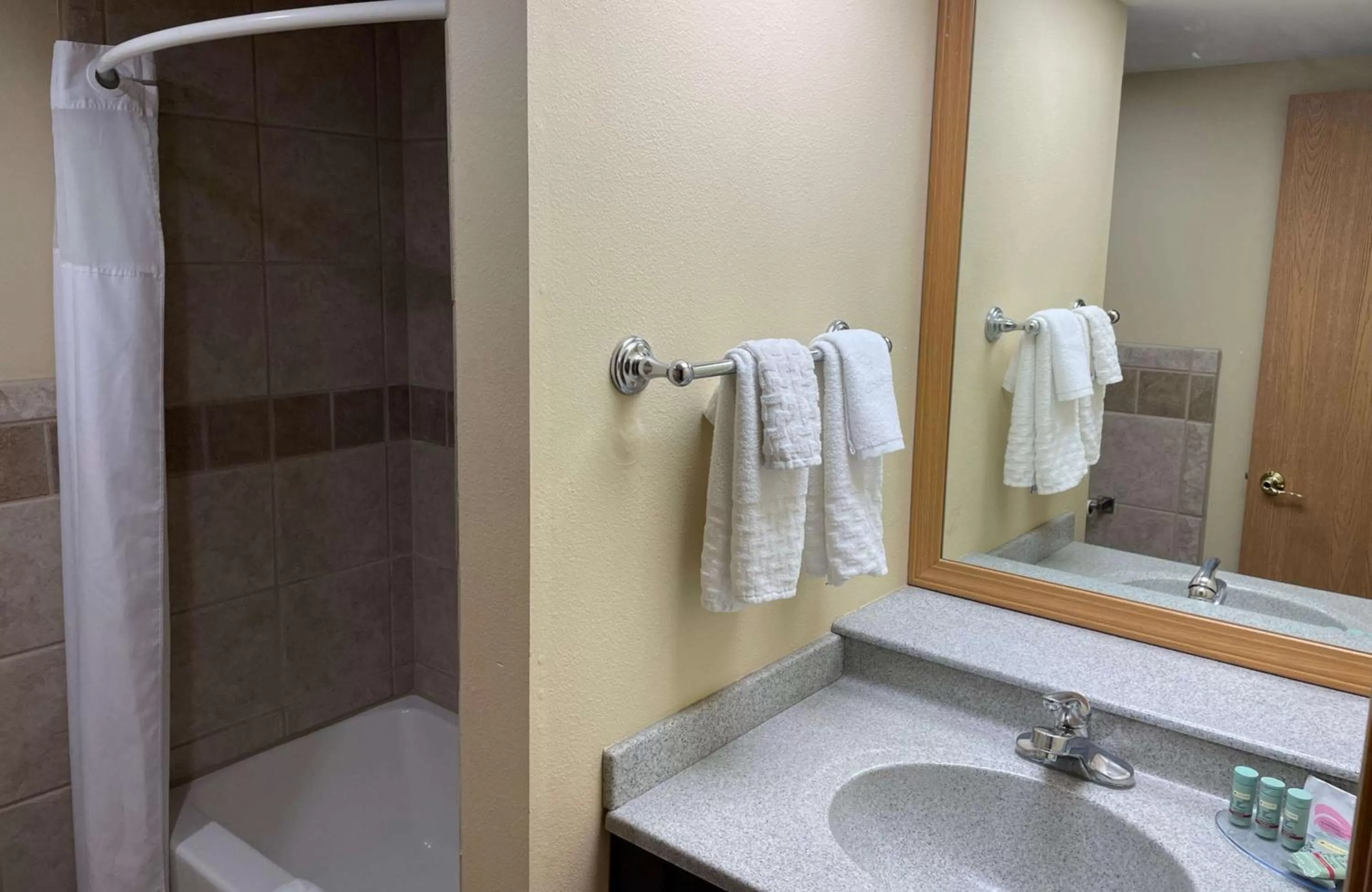 Bathroom in Crossroads Hotel & Event Center