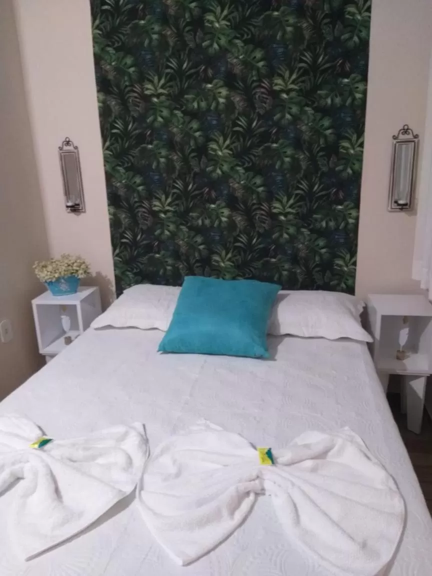 Bed in Pousada Dois Rios