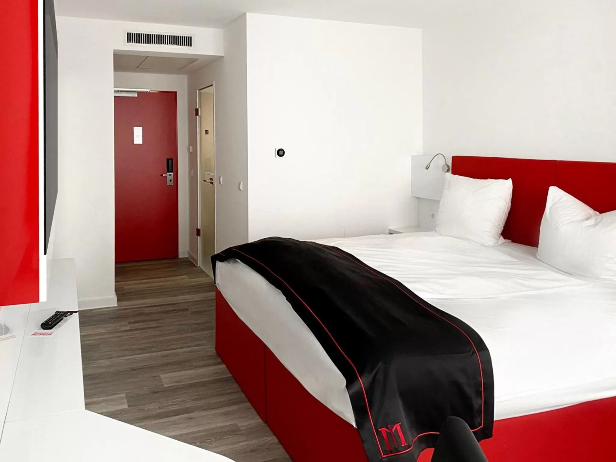 Photo of the whole room, Bed in DORMERO Hotel Darmstadt