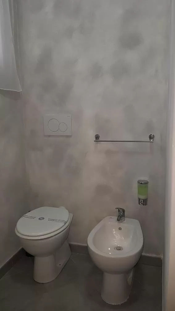 Bathroom in ILLUVIA affitto camere