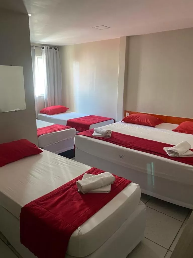 Bed in Nalu Beach Hotel pousada