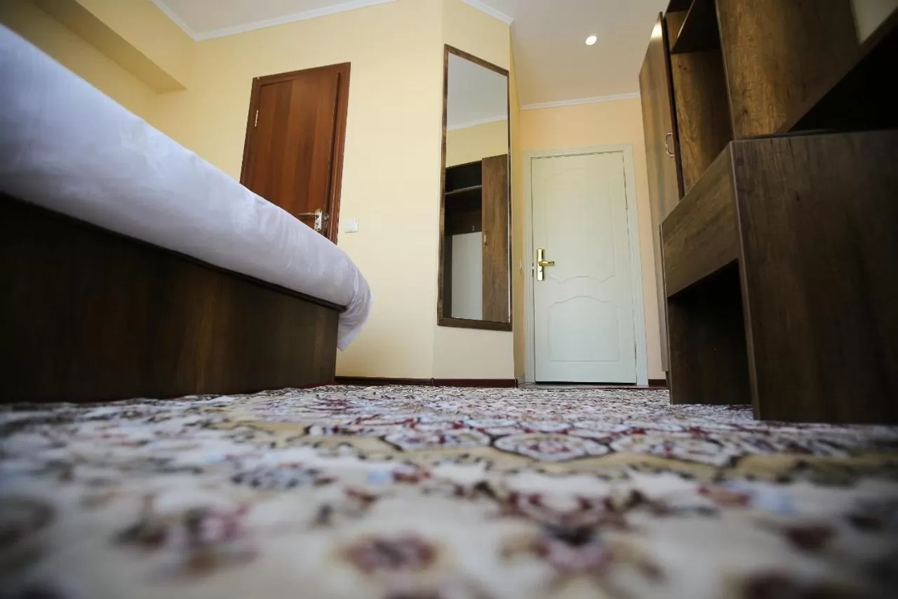 Bed in Altai Business Hotel