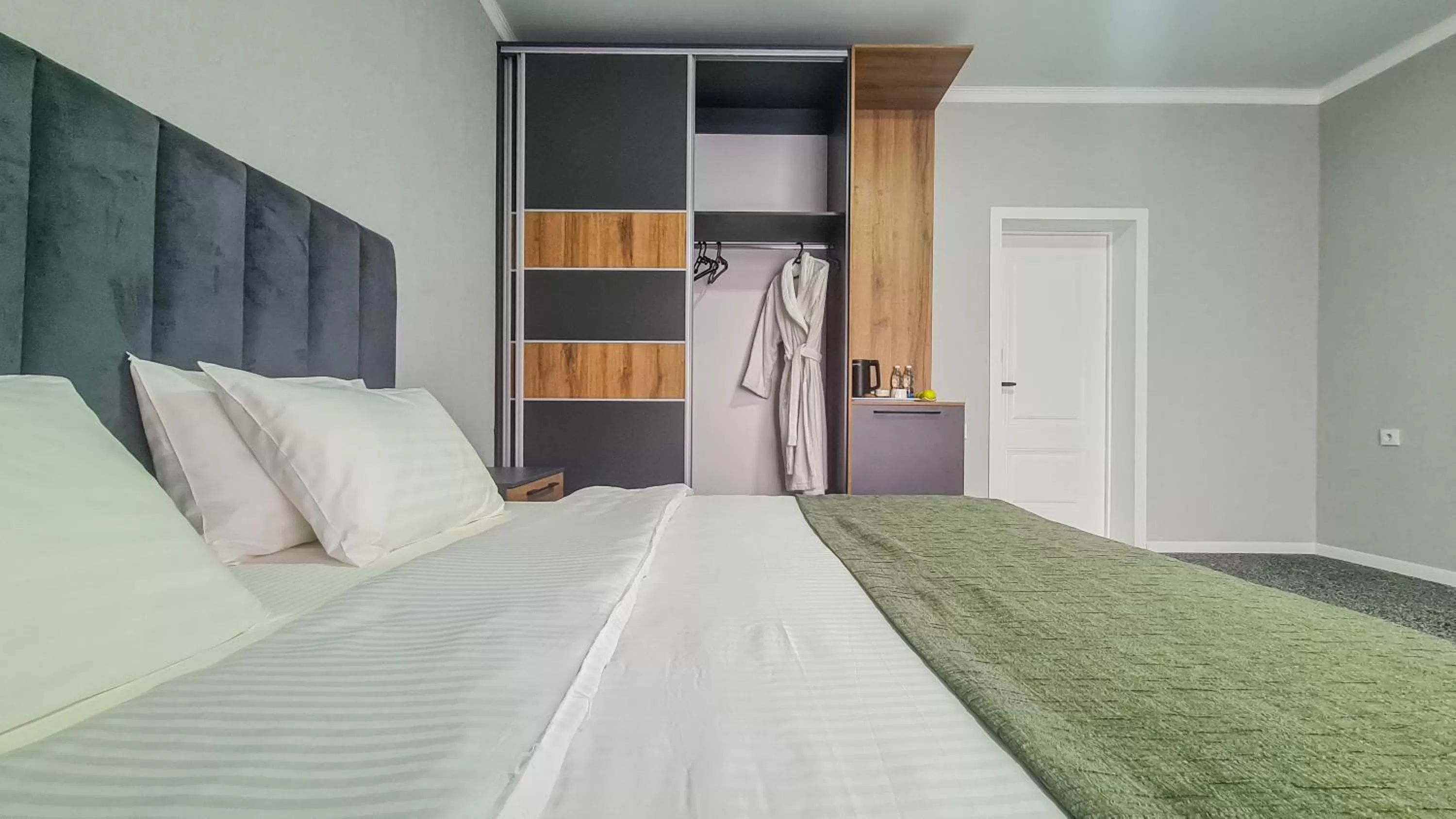 Property building, Bed in Dosman Hotel Bishkek