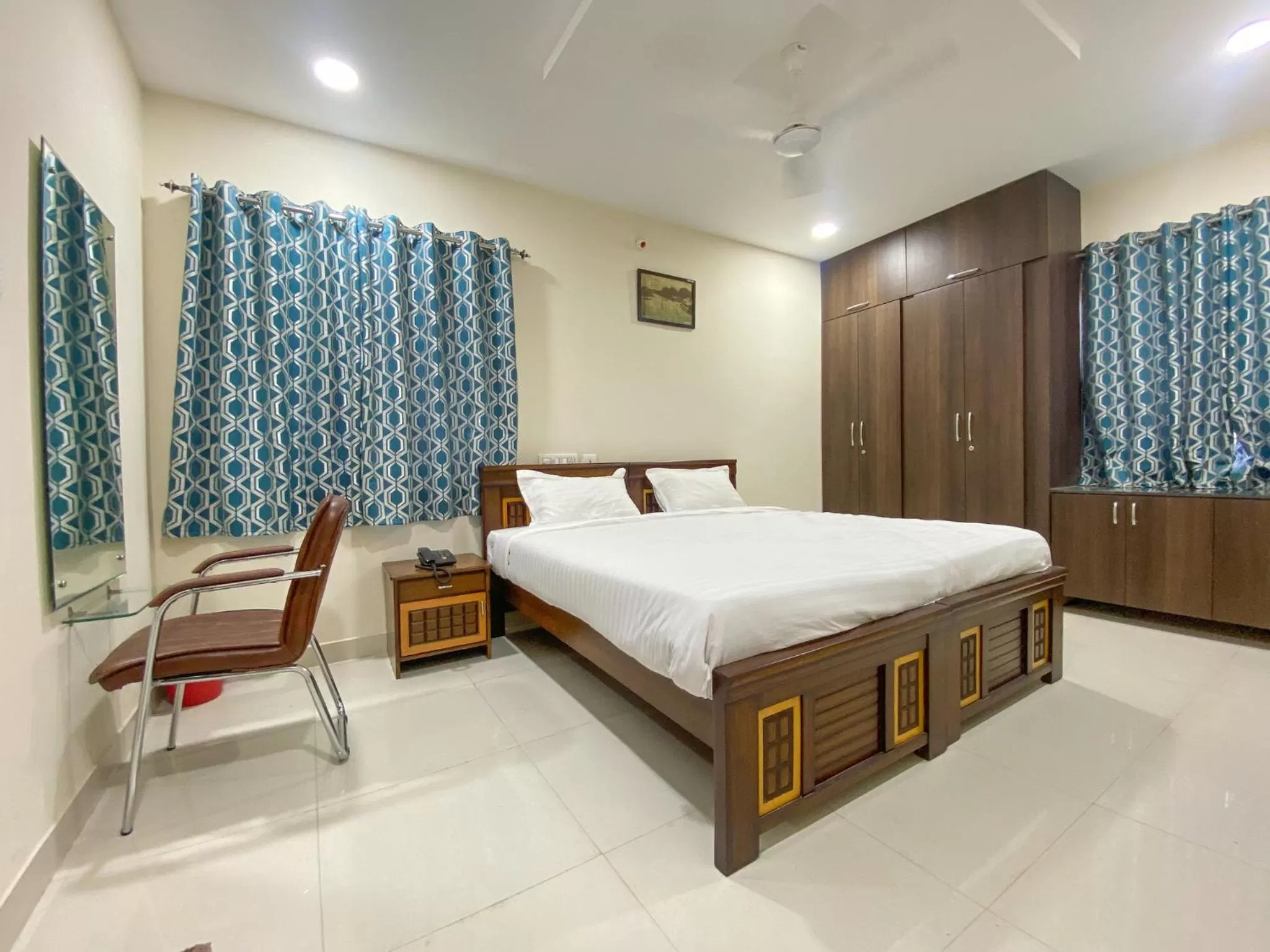 Photo of the whole room, Bed in Hotel Voila Atnest Suites Kokapet, Business Hotel