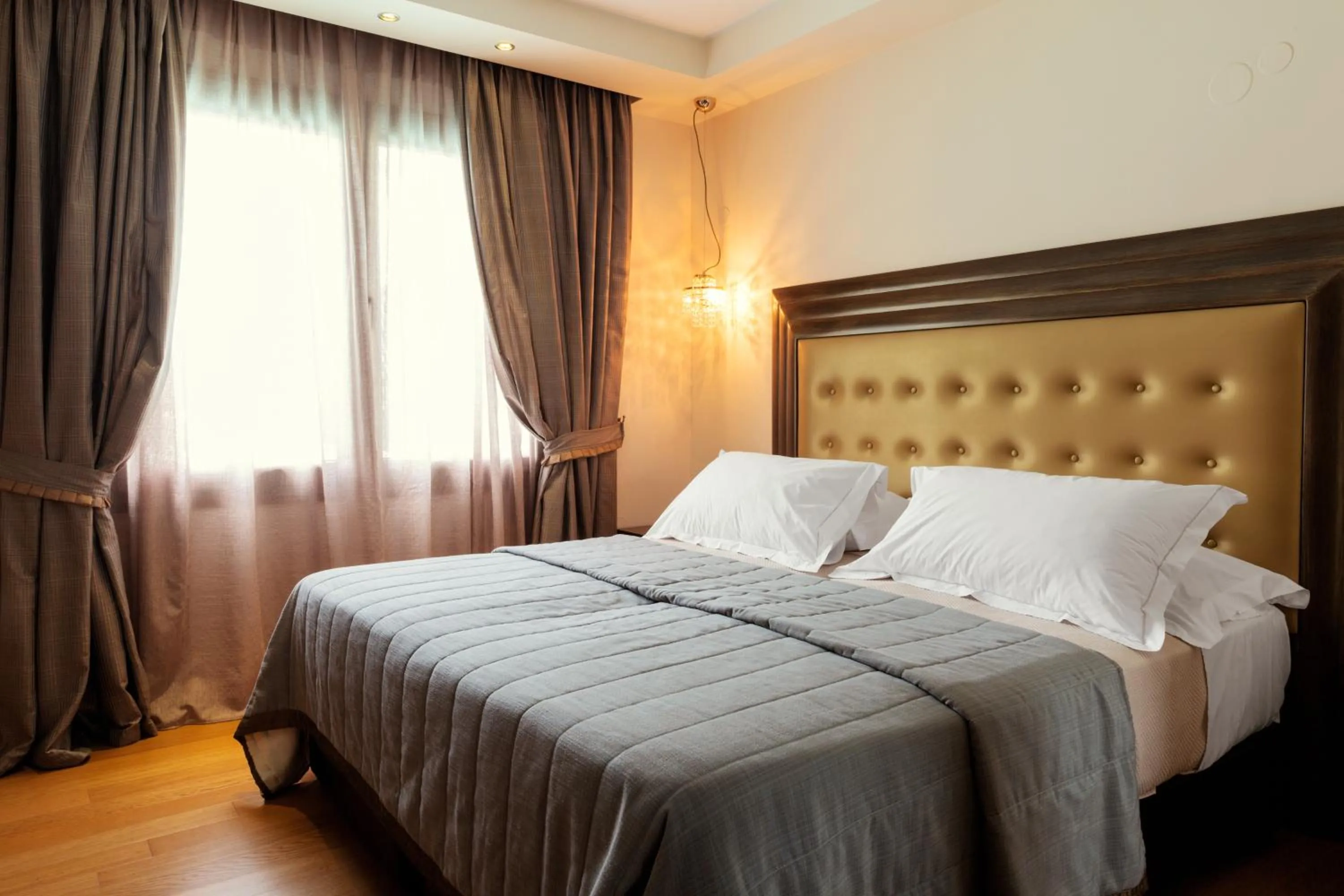 Bed in Mediterranean Village Hotel & Spa