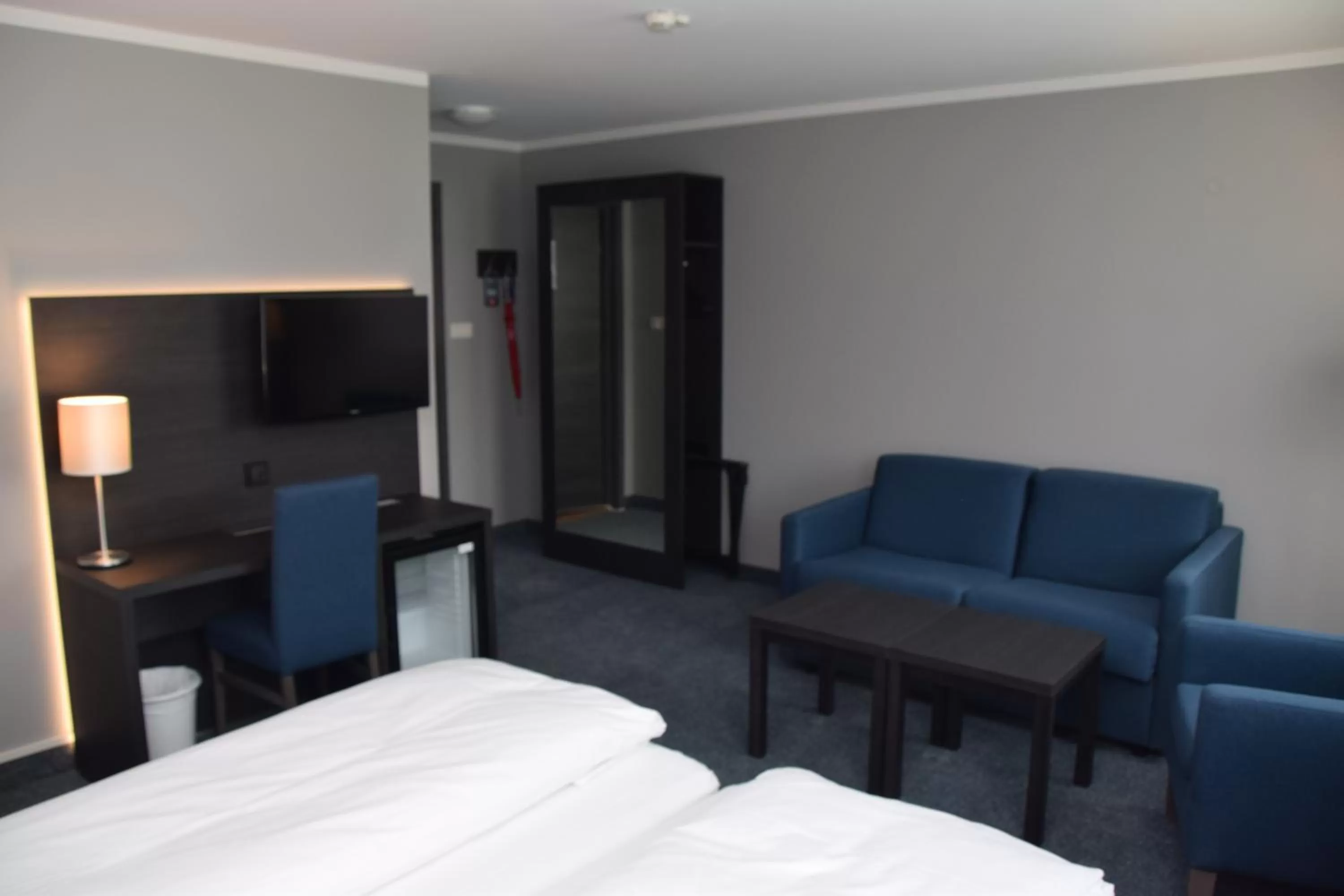 Seating area, Bed in Thon Partner Hotel Måløy