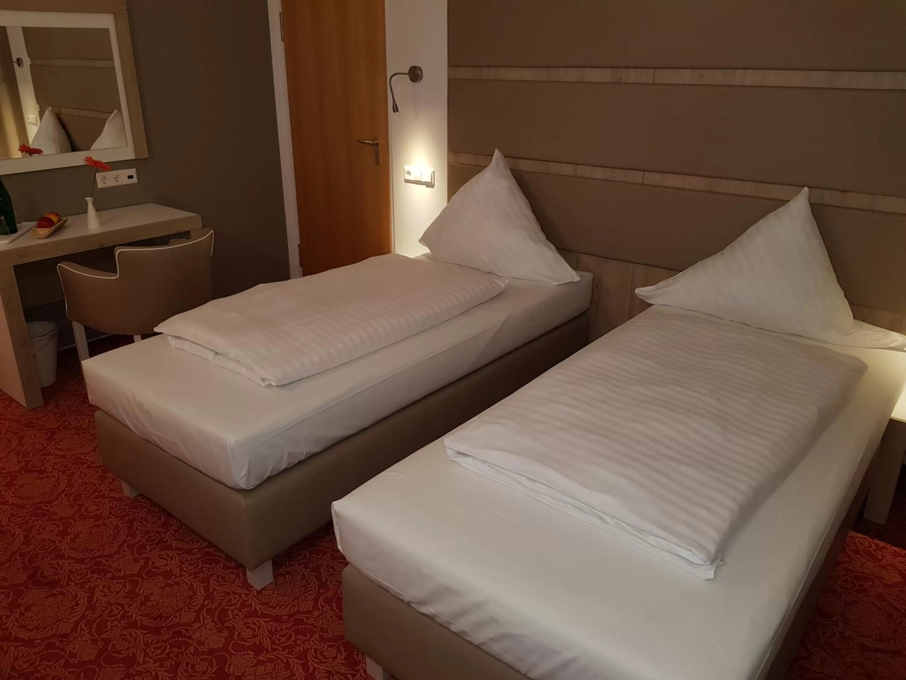 Bed in Confour Hotel