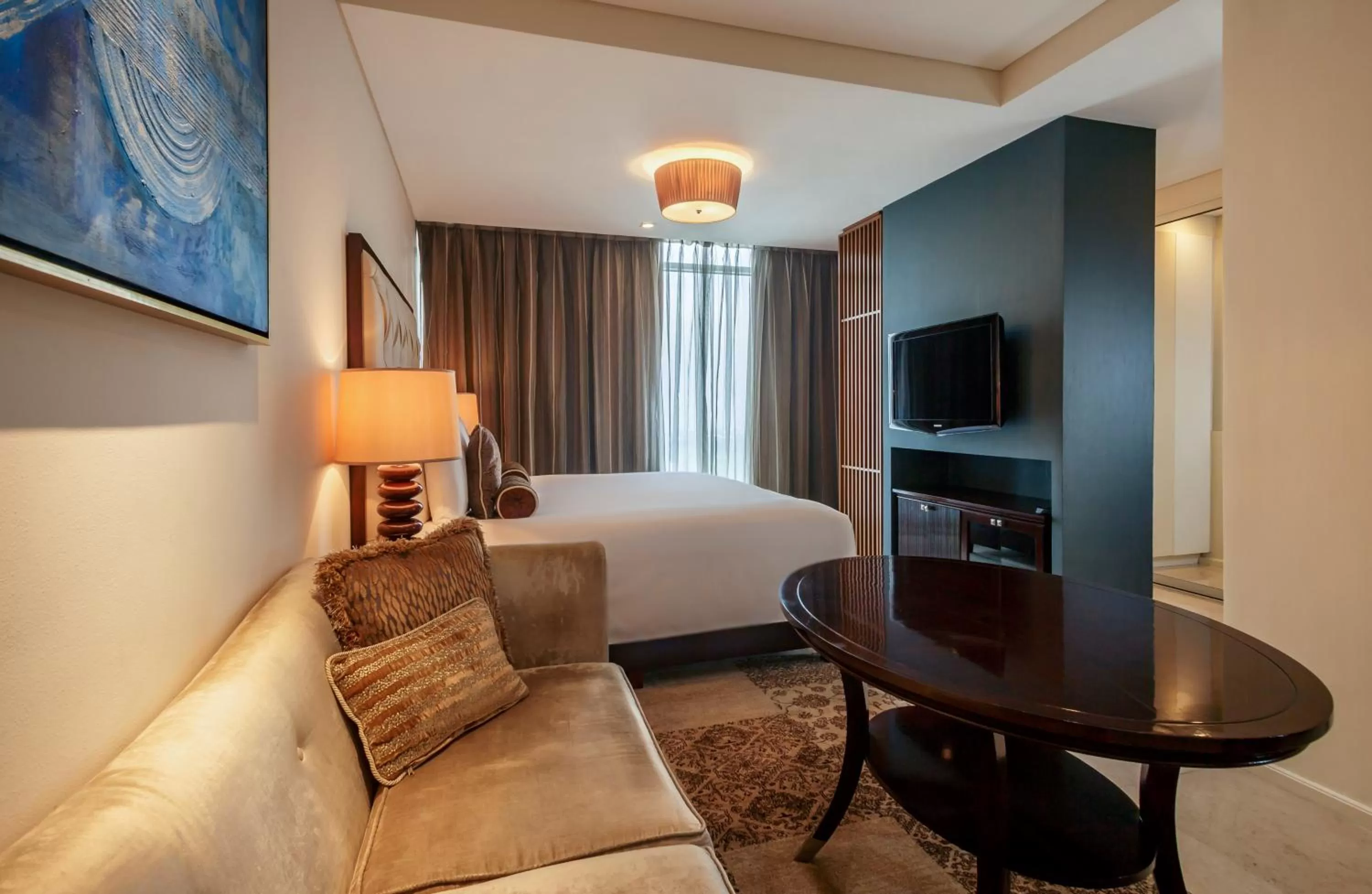 Living room, Bed in Joy Nostalg Hotel and Suites Manila Managed by The Ascott Limited