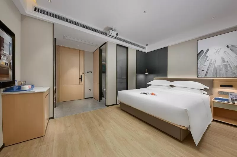 Bed in Fengyue Light Shang Hotel Guangzhou Baiyun Airport Store