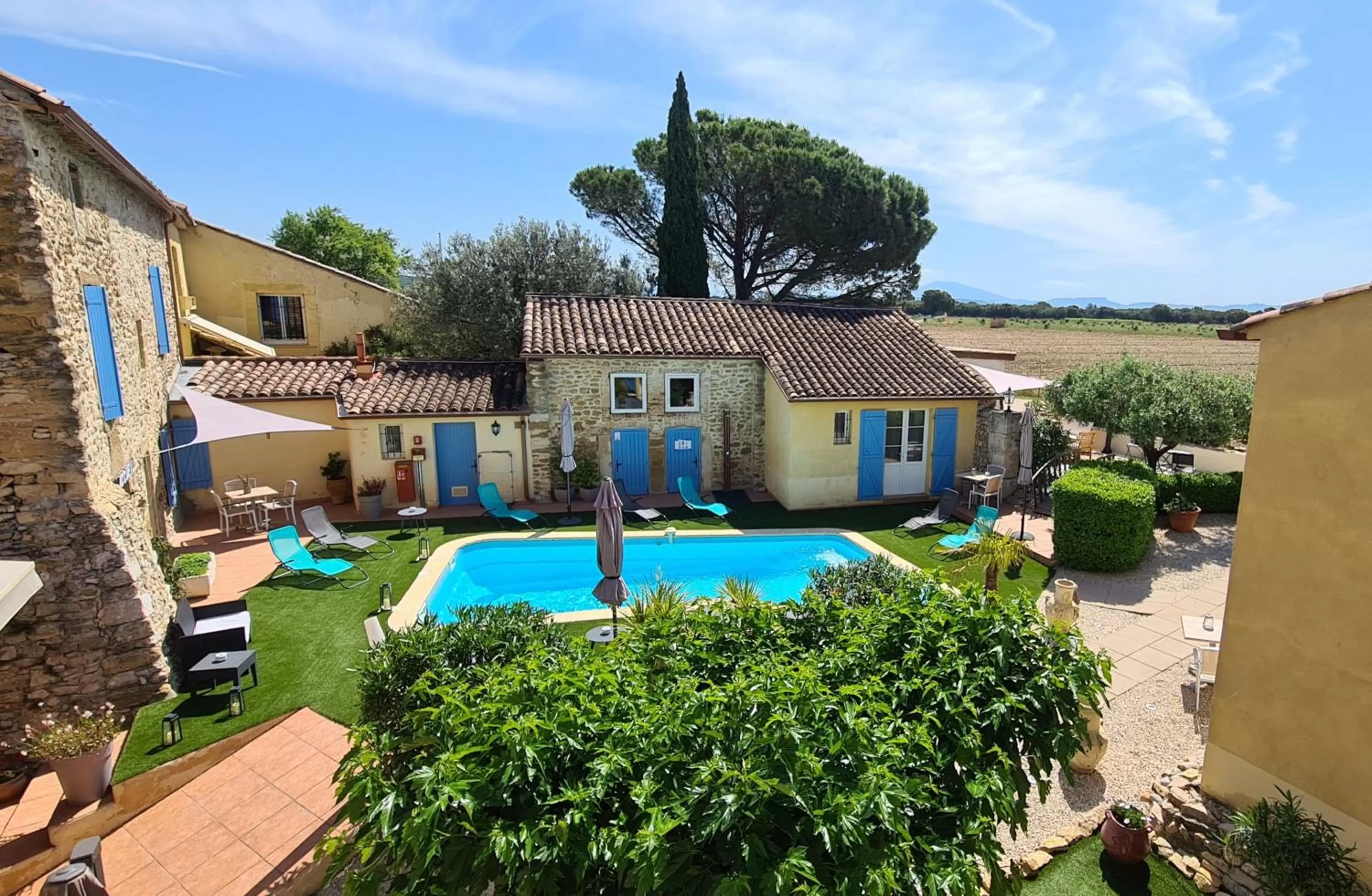 Pool view in Logis Hôtel La Bastide Saint Bach