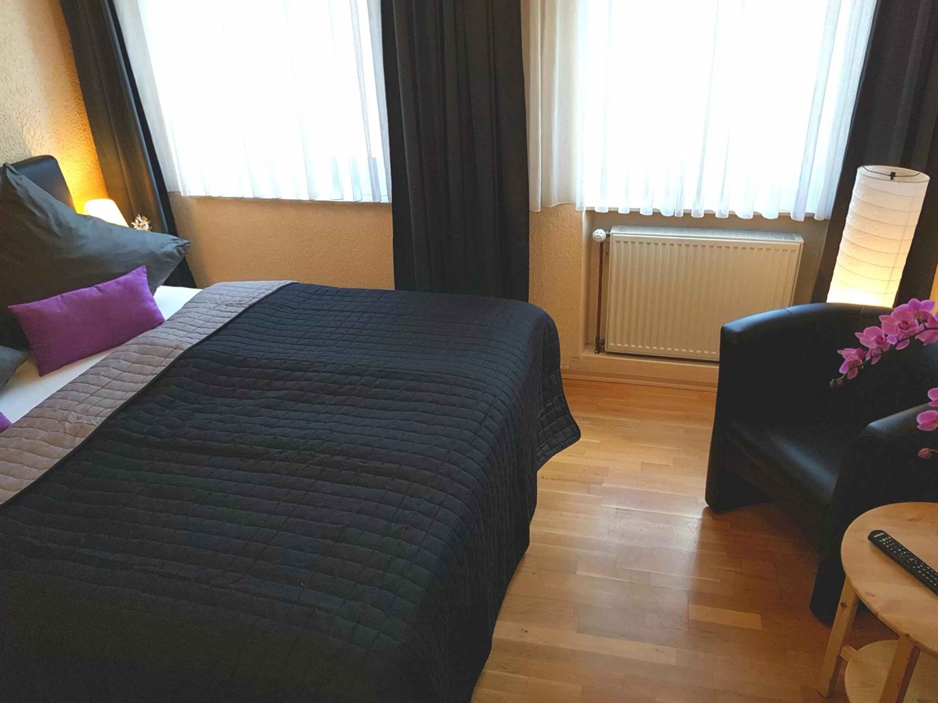 Bed in Hotel Exquisite