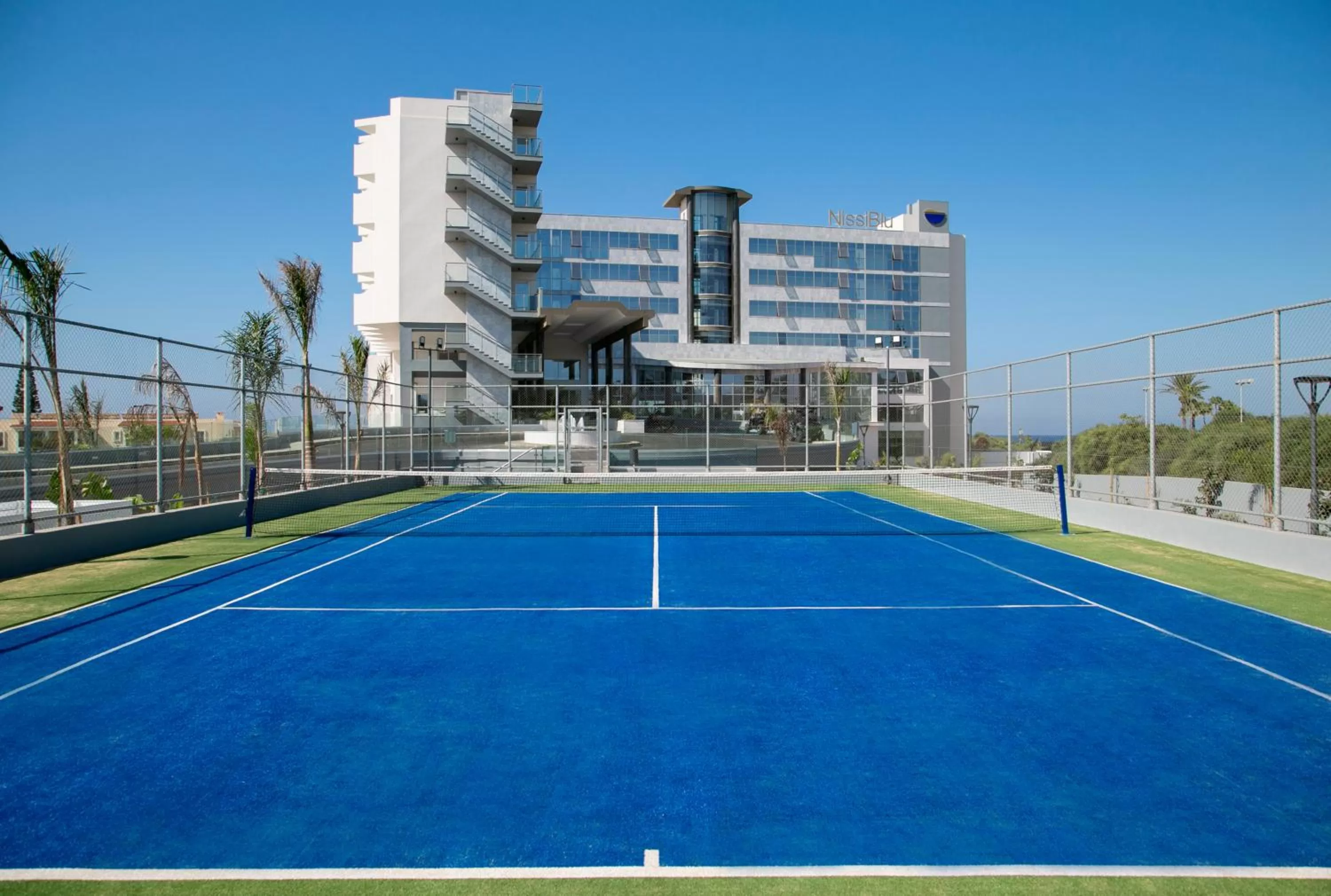 Tennis court in NissiBlu Beach Resort