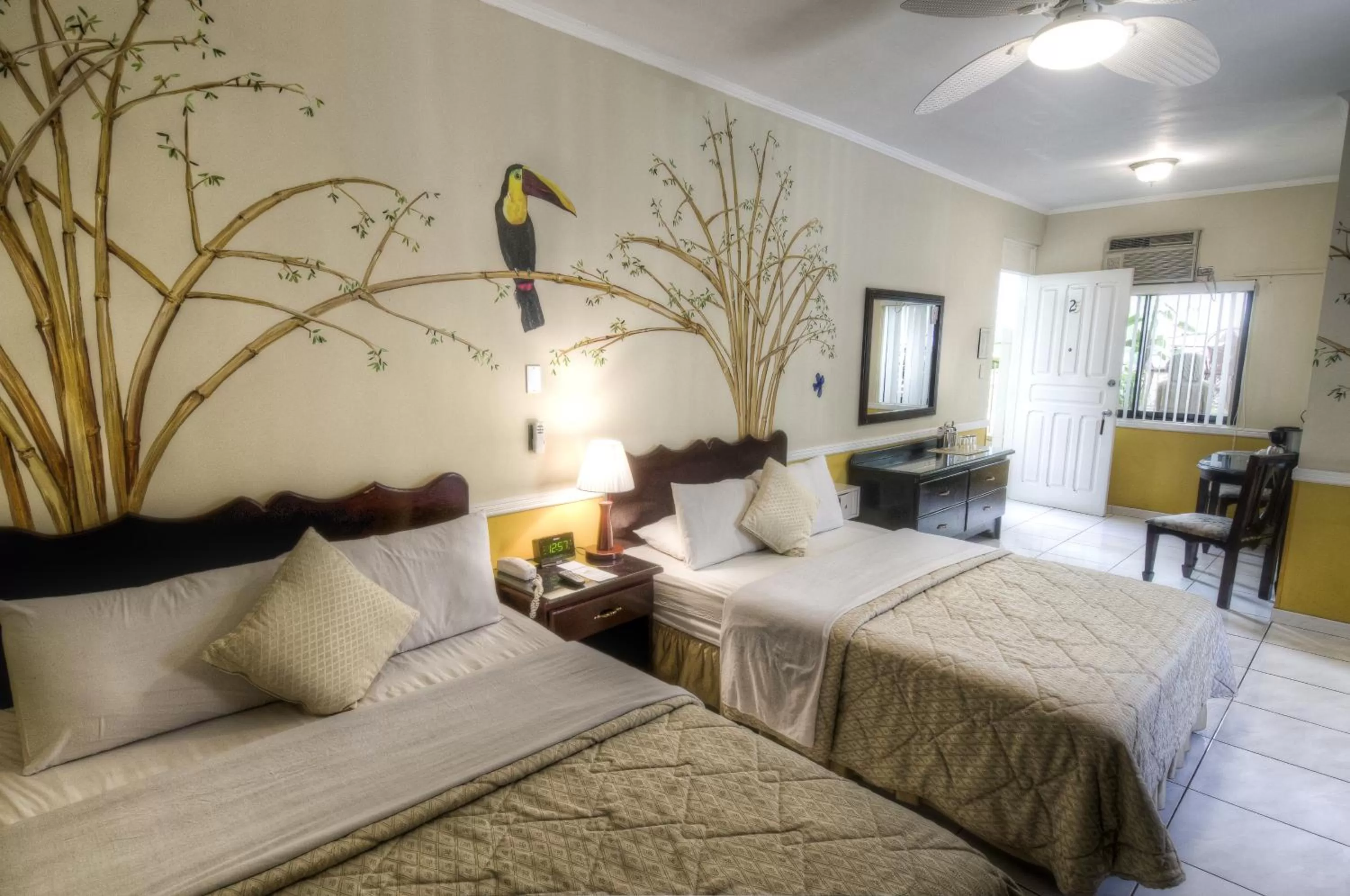 Queen Room with Two Queen Beds - single occupancy in Adventure Inn