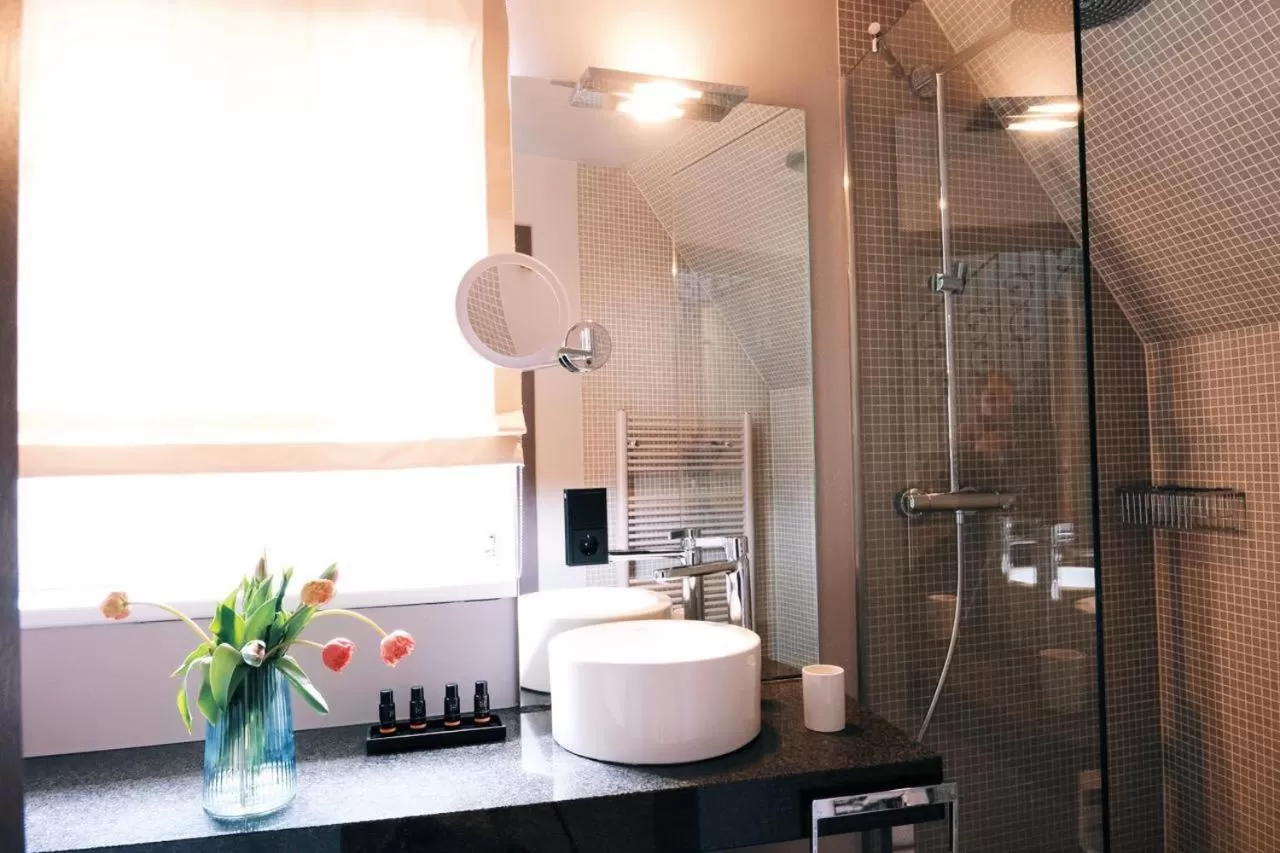 Bathroom in Zum Löwen Design Hotel Resort & Spa
