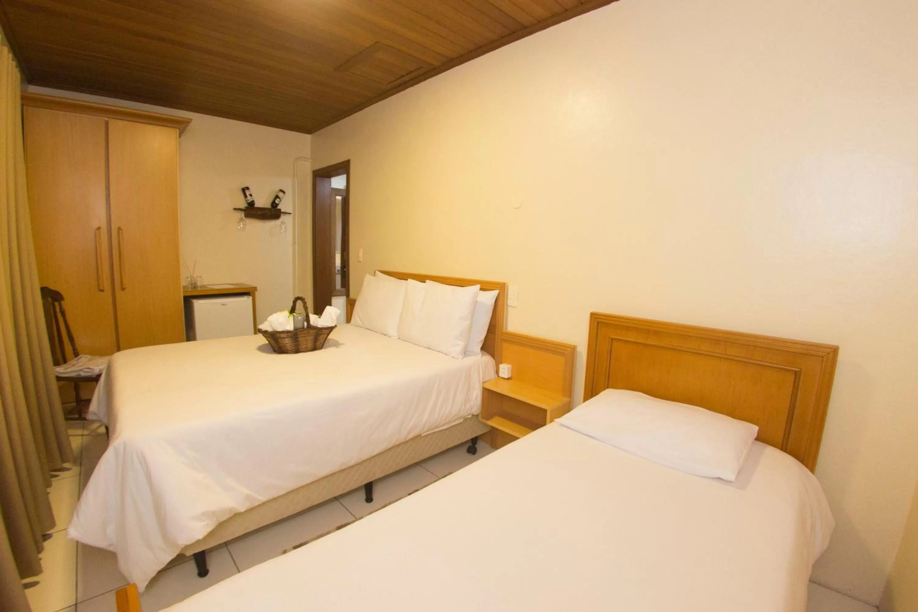 Bed in Pousada Green House by Conrado Vitali