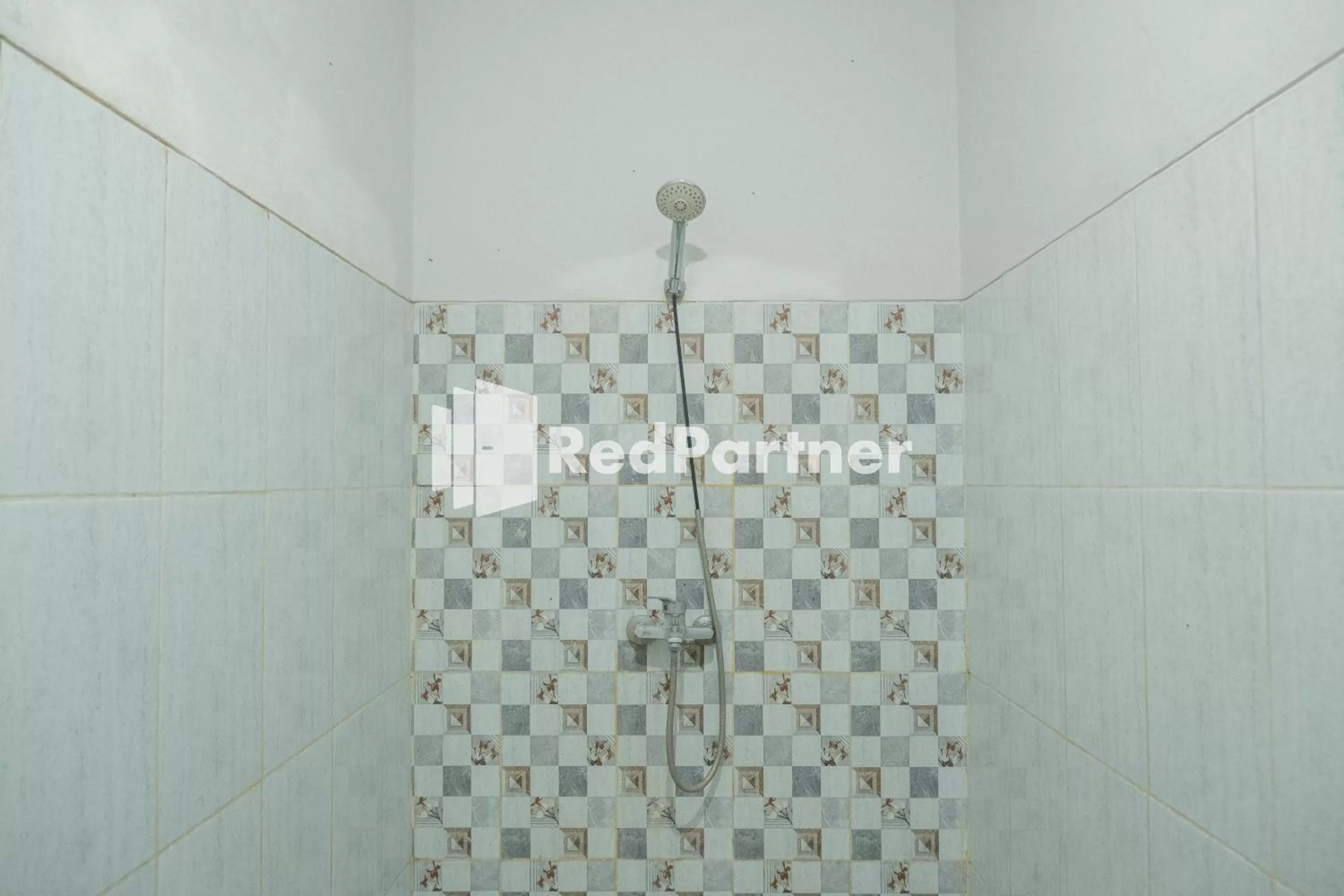 Bathroom in Crown Residence near Tugu Yogyakarta RedPartner