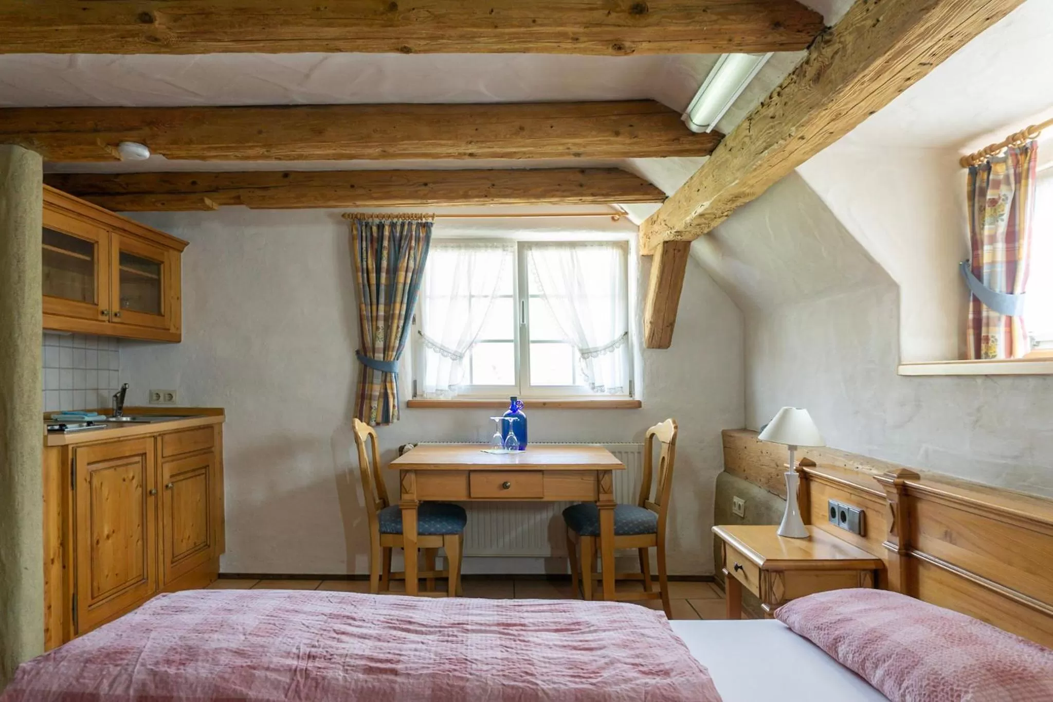 Bedroom in Naturhotel Holzwurm