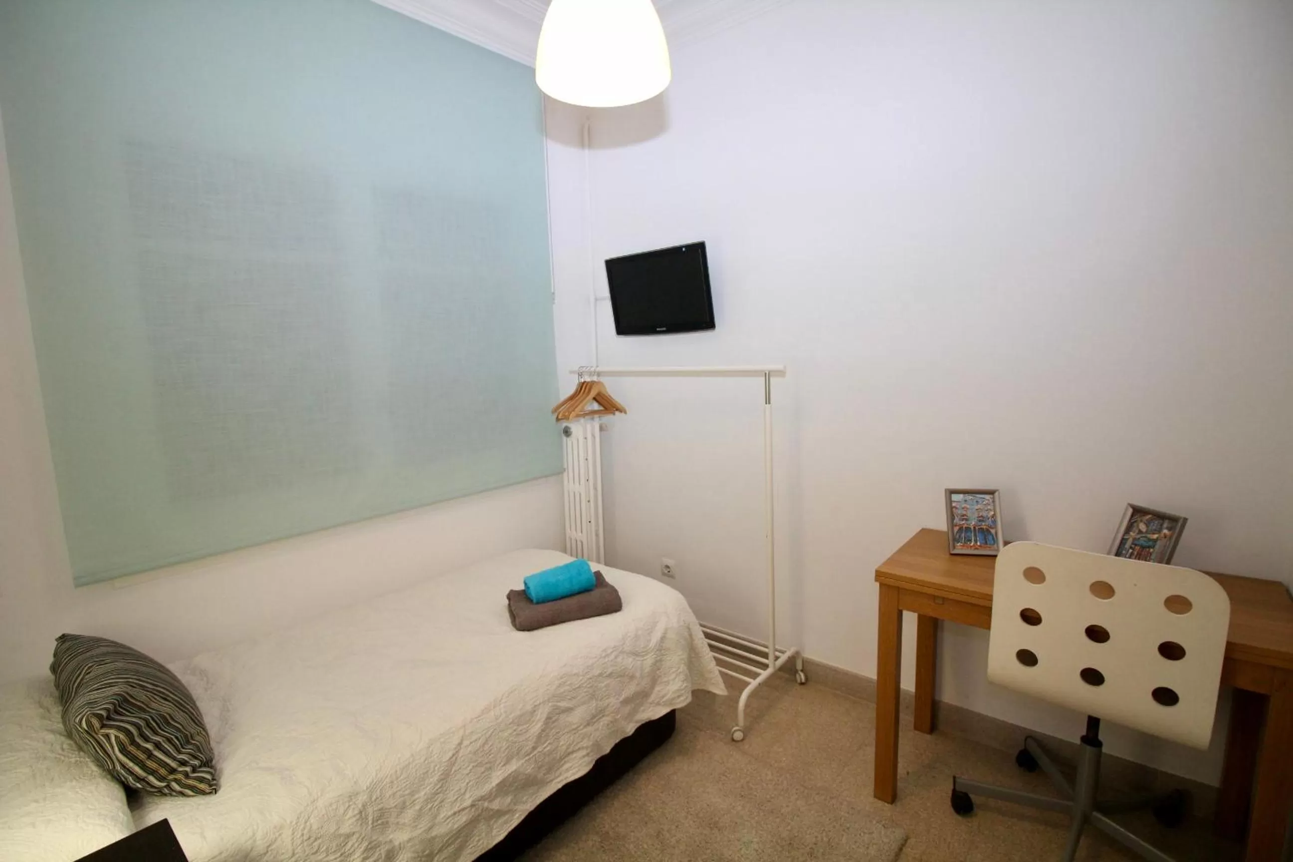 Bed in Nuevo Balmes Habitaciones