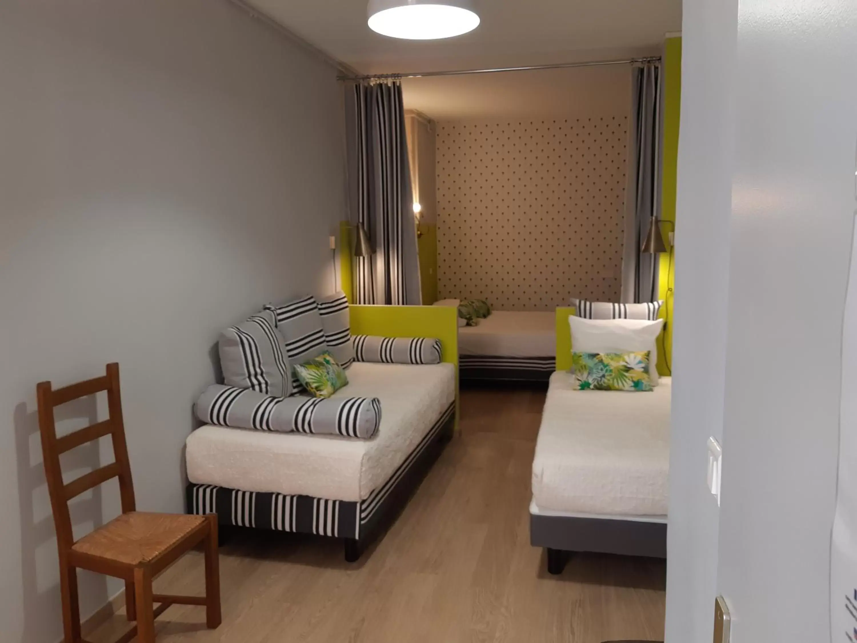 Family Room with Bath in Hôtel Des Arts, Artisanal et Indépendant Family Room with Bath in Hôtel Des Arts, Artisanal et Indépendant