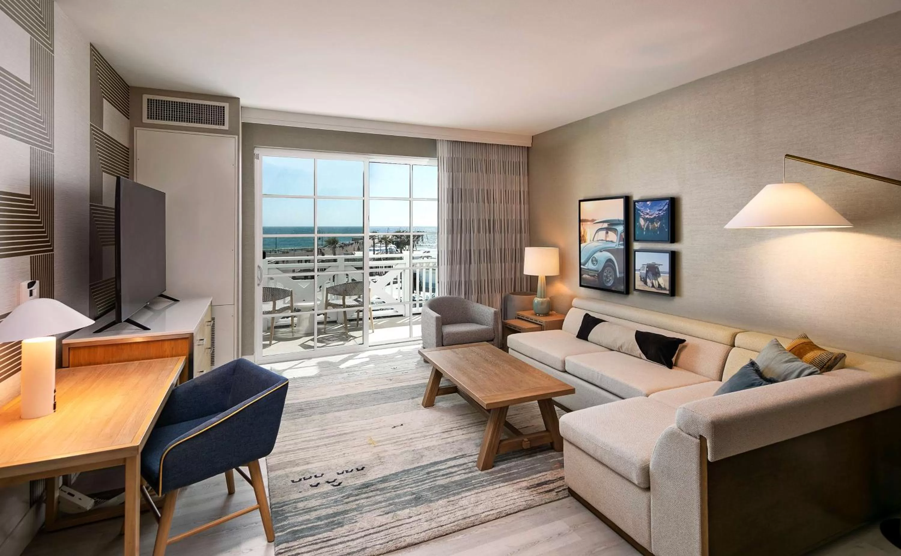 Living room in Inn at the Pier Pismo Beach, Curio Collection by Hilton