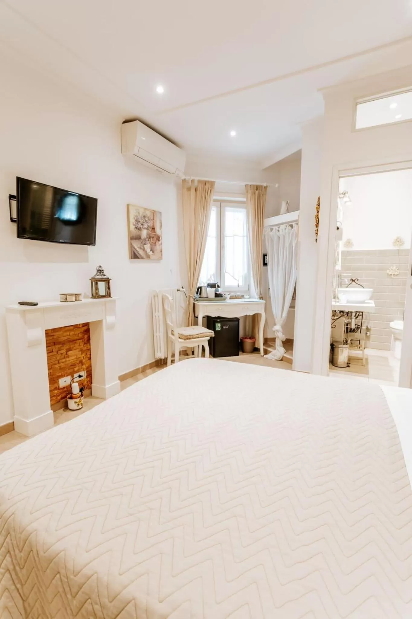 Bed in Vatican Boutique inn