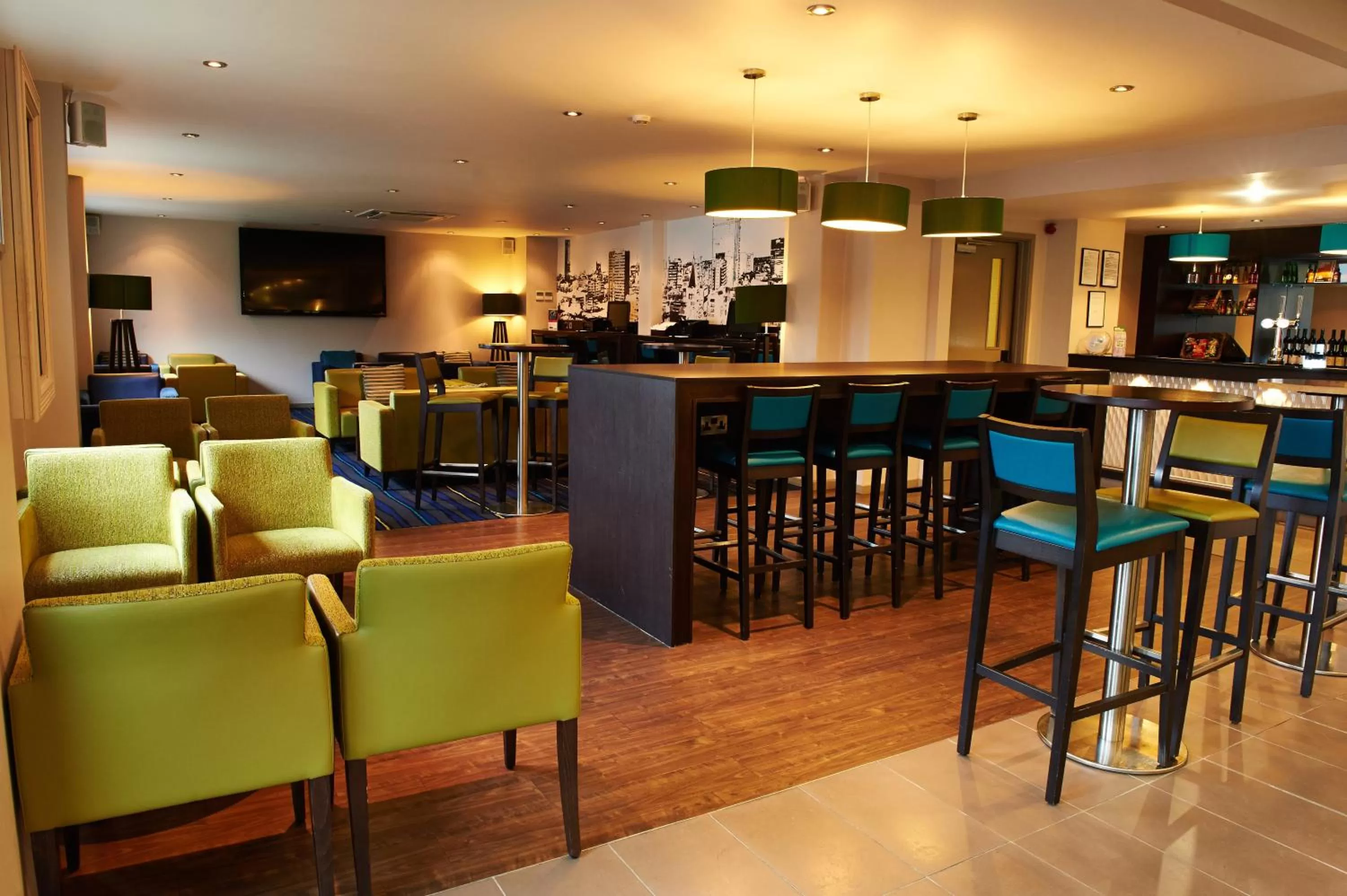 Lounge or bar in Holiday Inn Express Manchester Airport by IHG