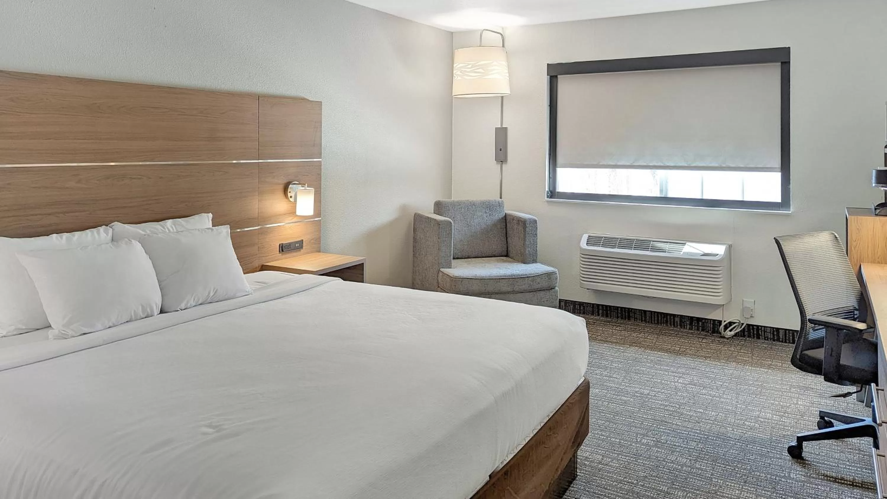 Bedroom, Bed in Estherville Hotel & Suites