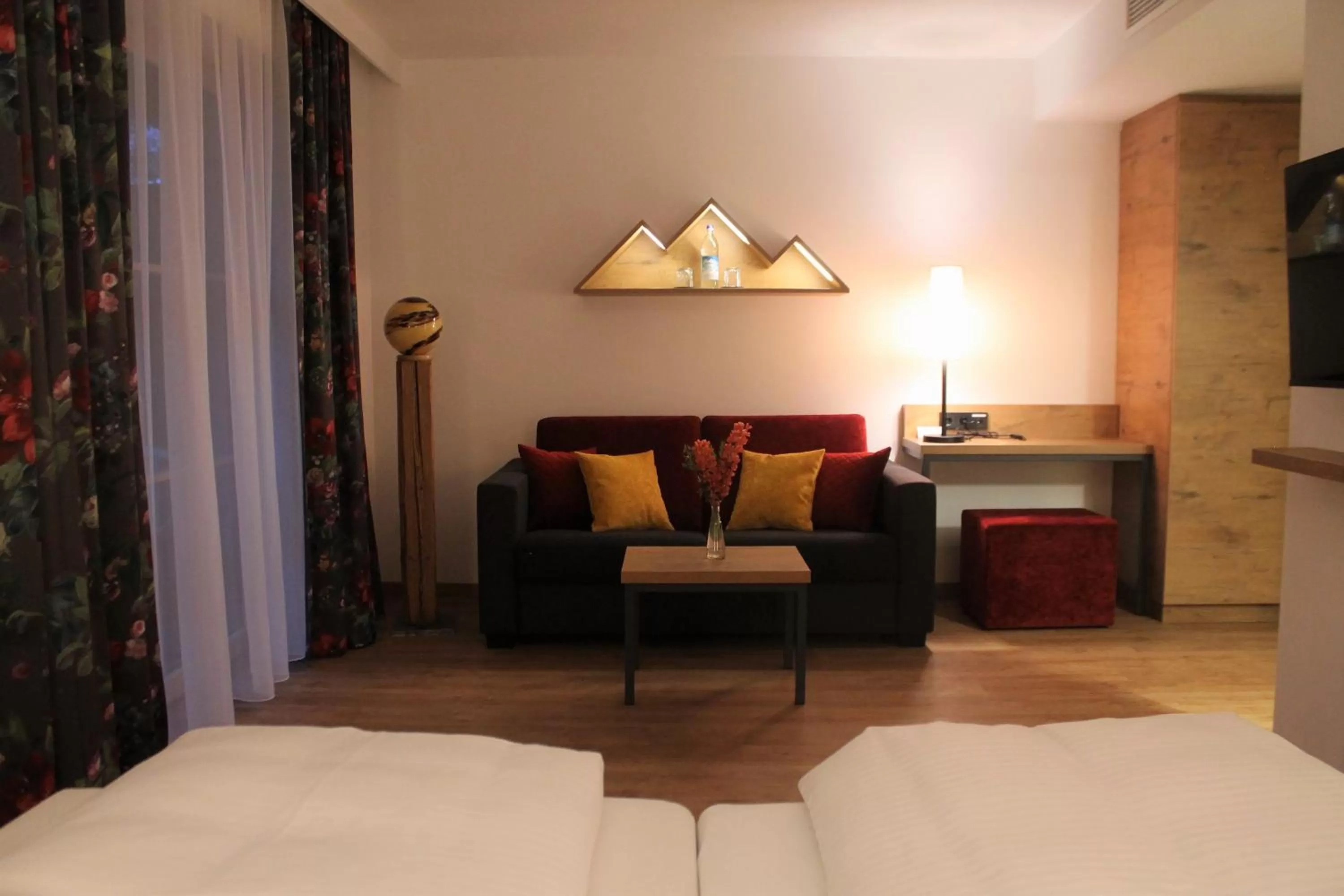 Living room, Bed in Gasthaus Steidl