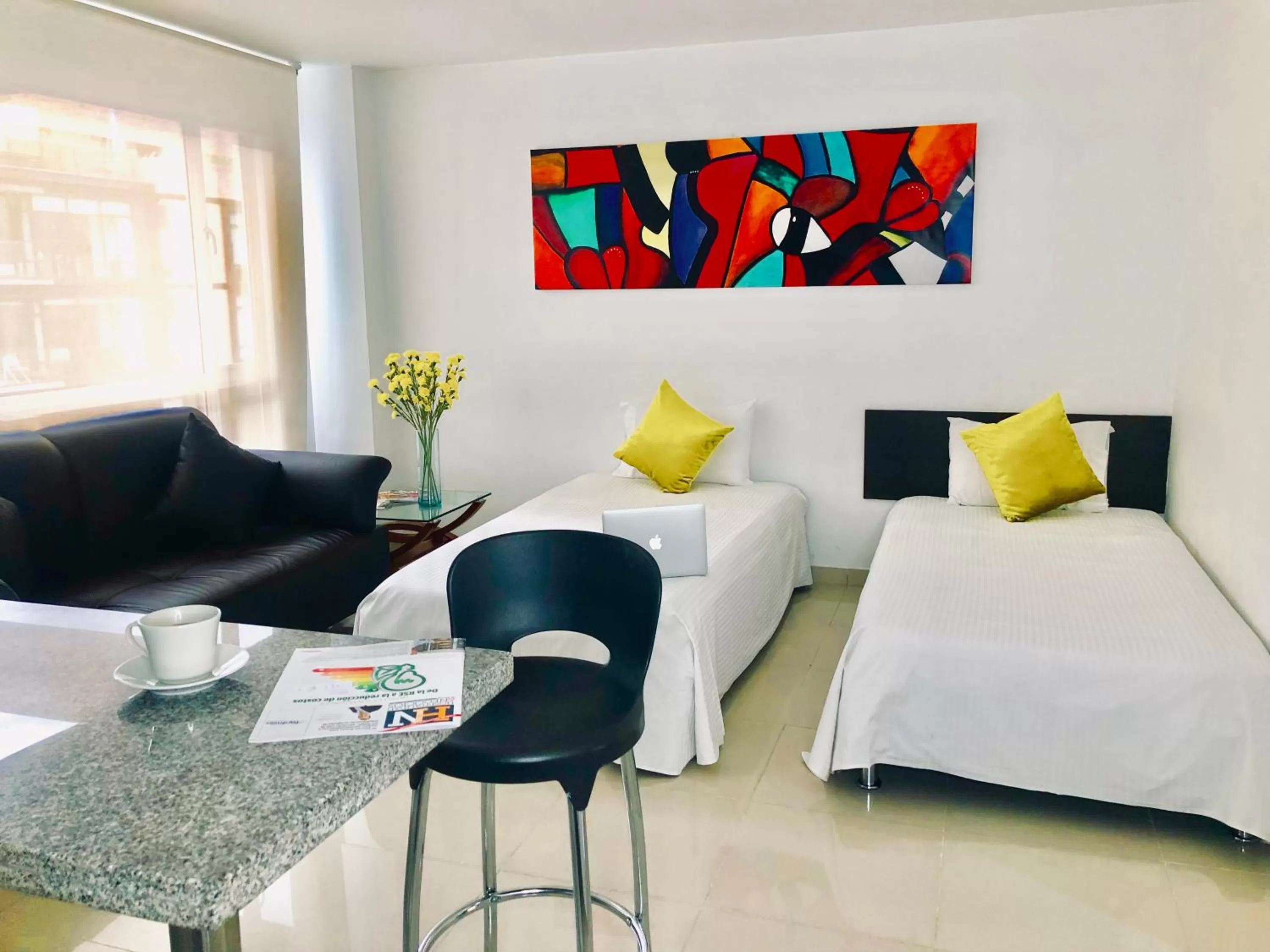 Bed in 122 Plaza Apartahotel