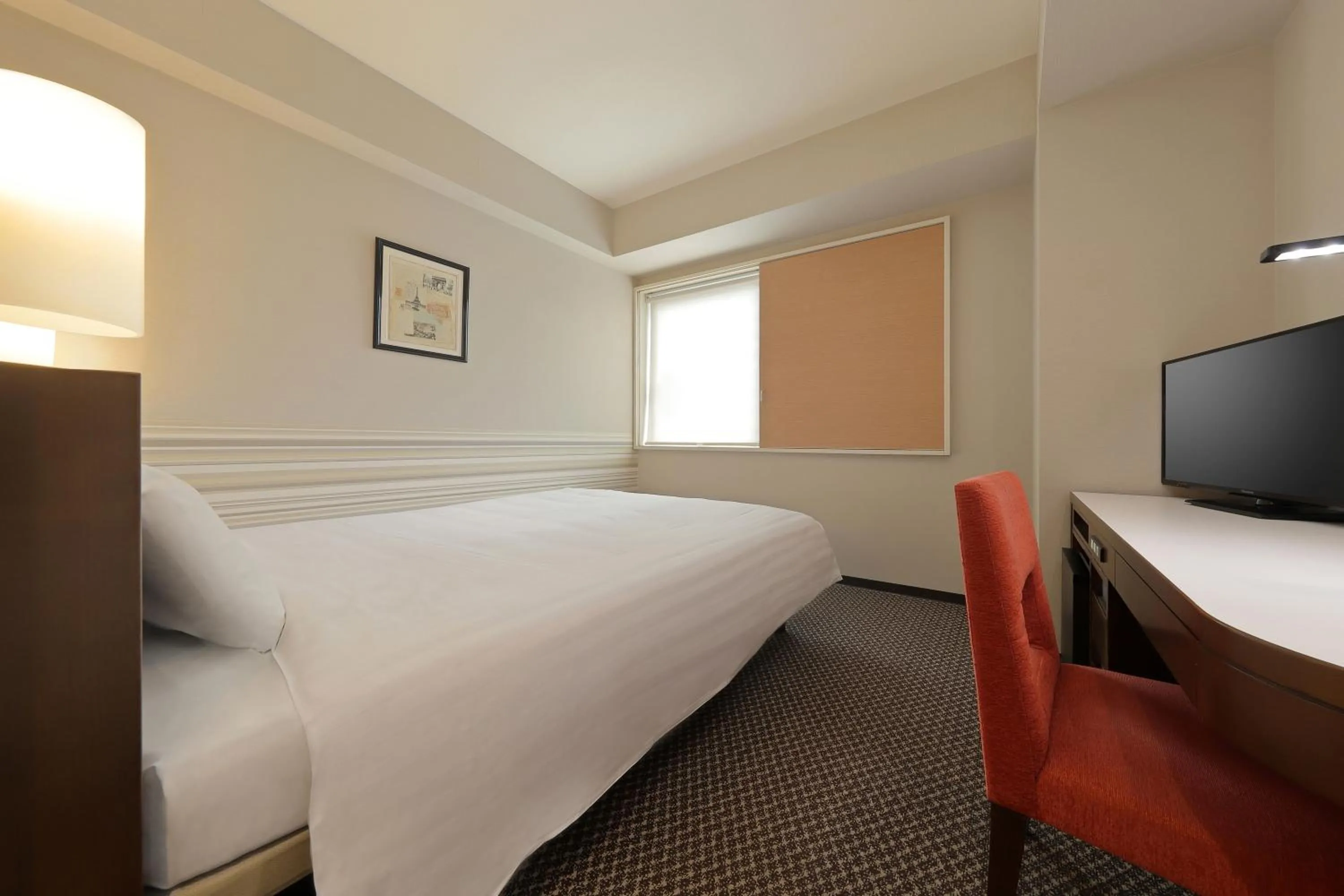 Bed in Keio Presso Inn Shinjuku