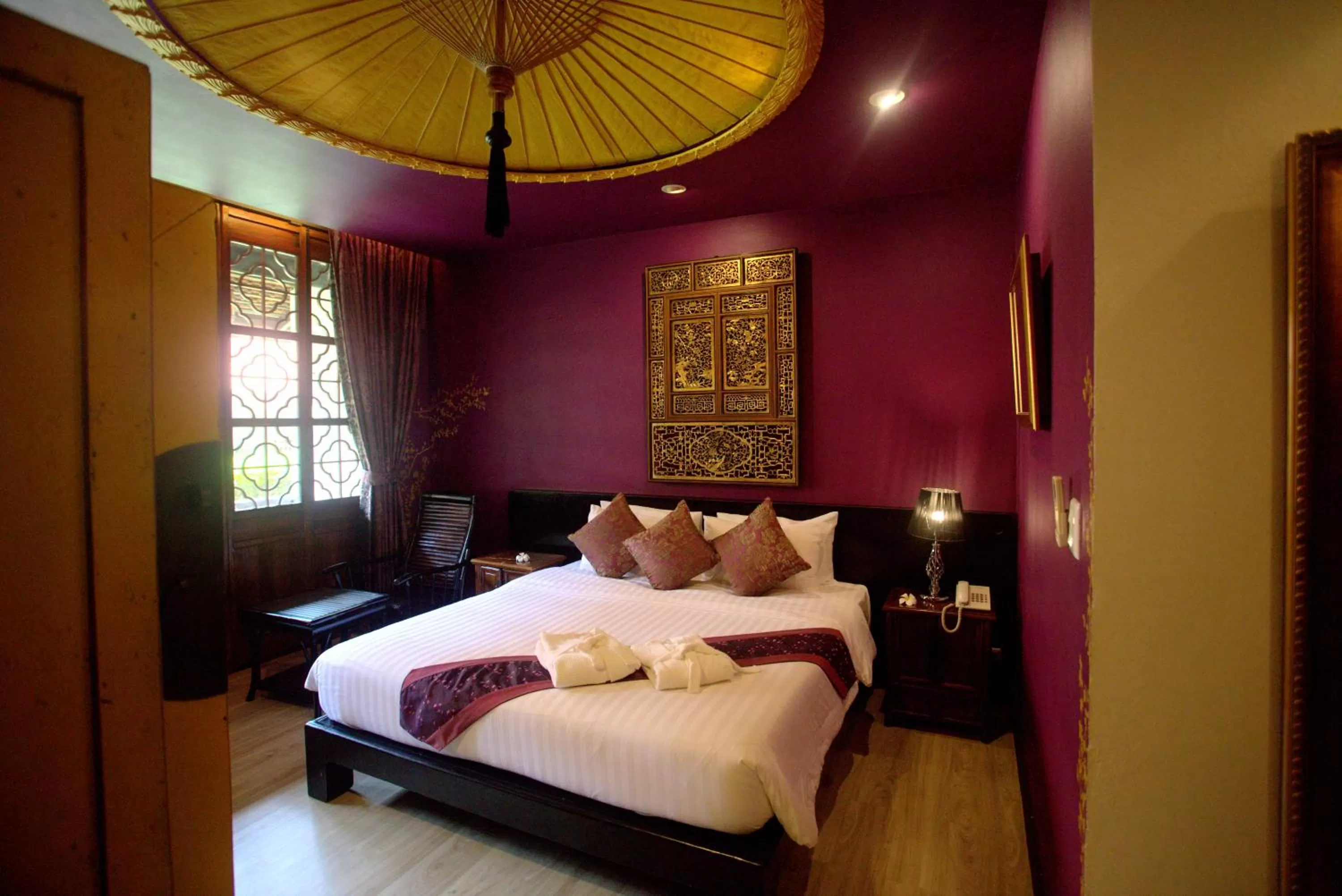 Bed in Tharaburi Resort