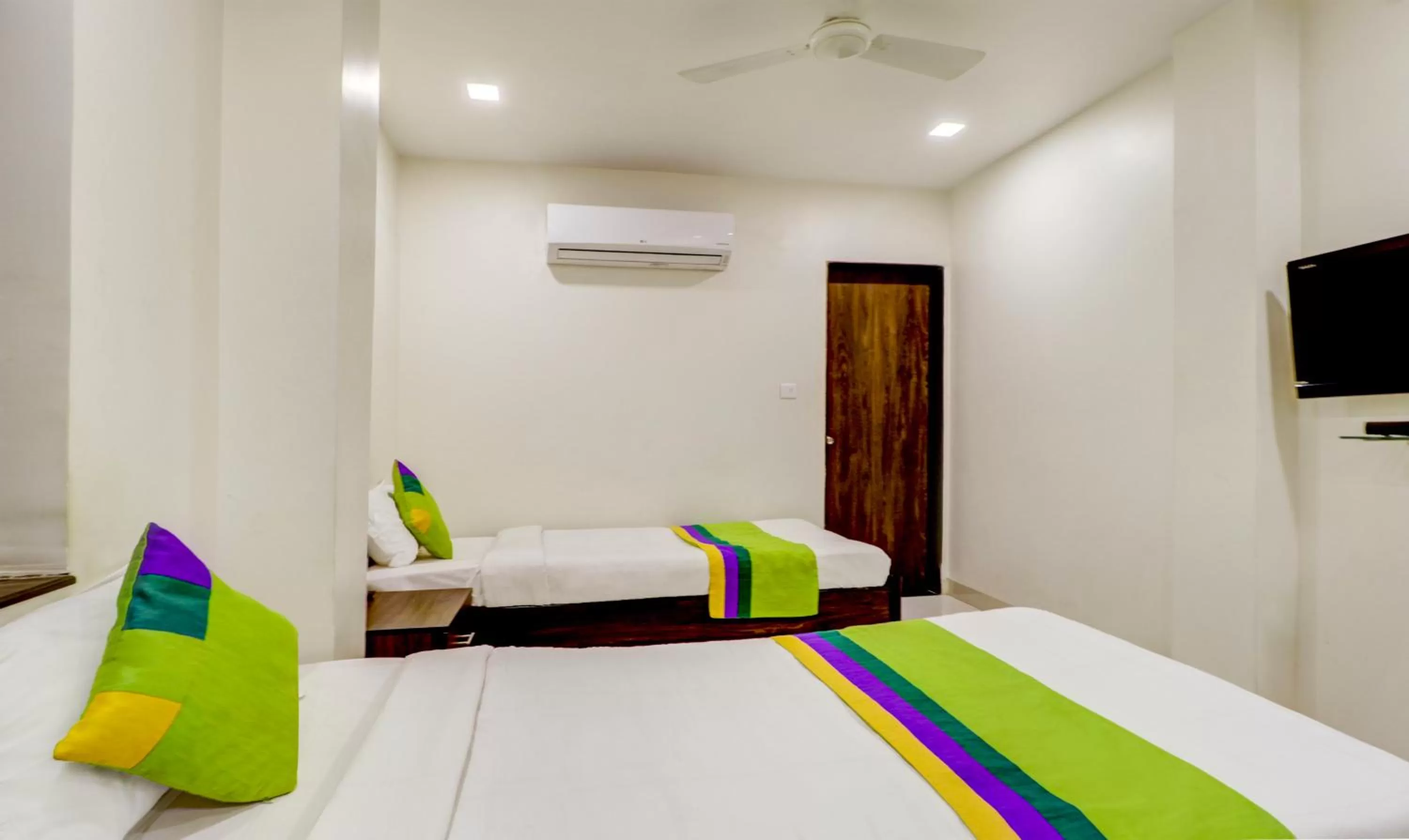 Bed in Treebo Trend Orange City