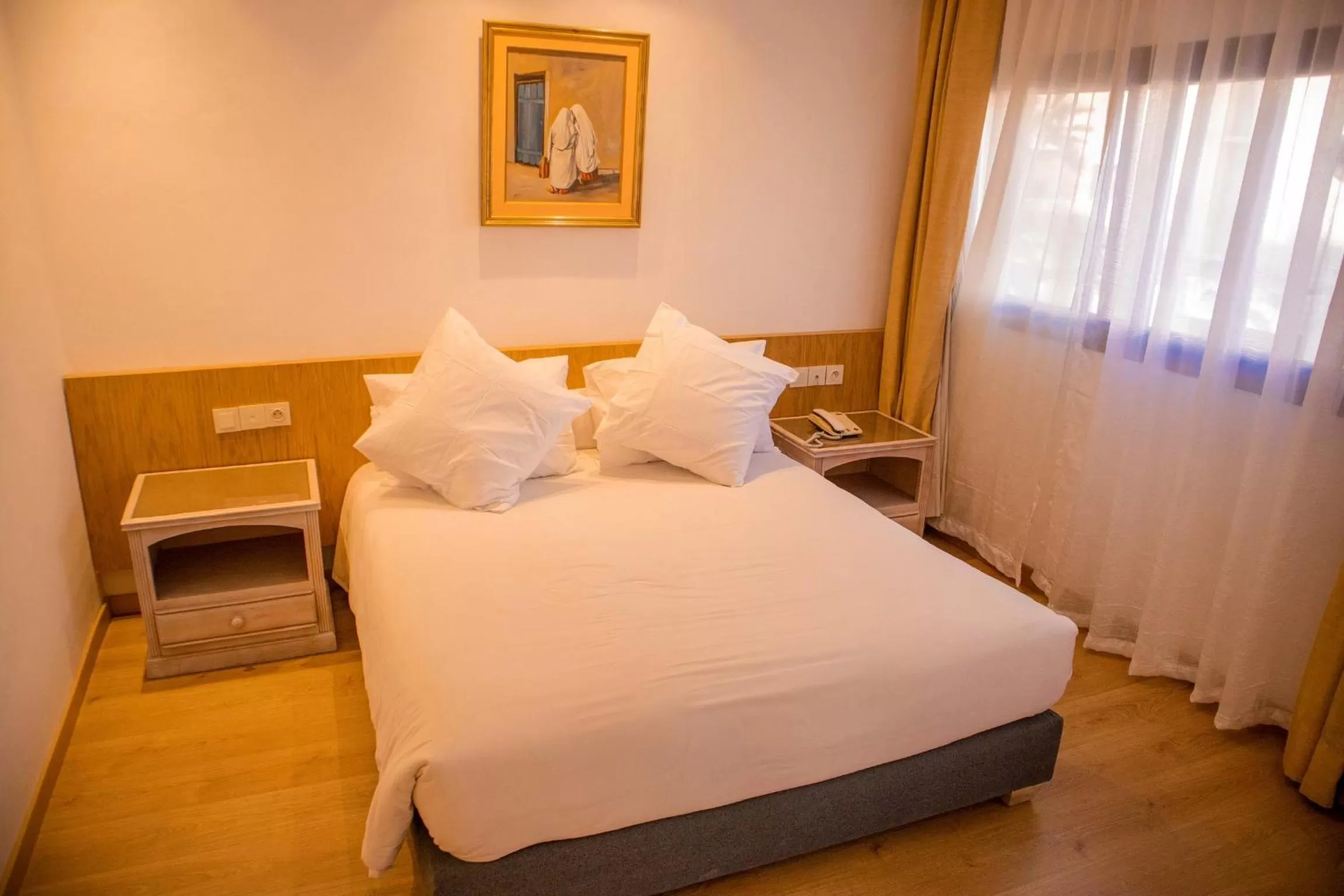 Bed in Sahara Line Hotel