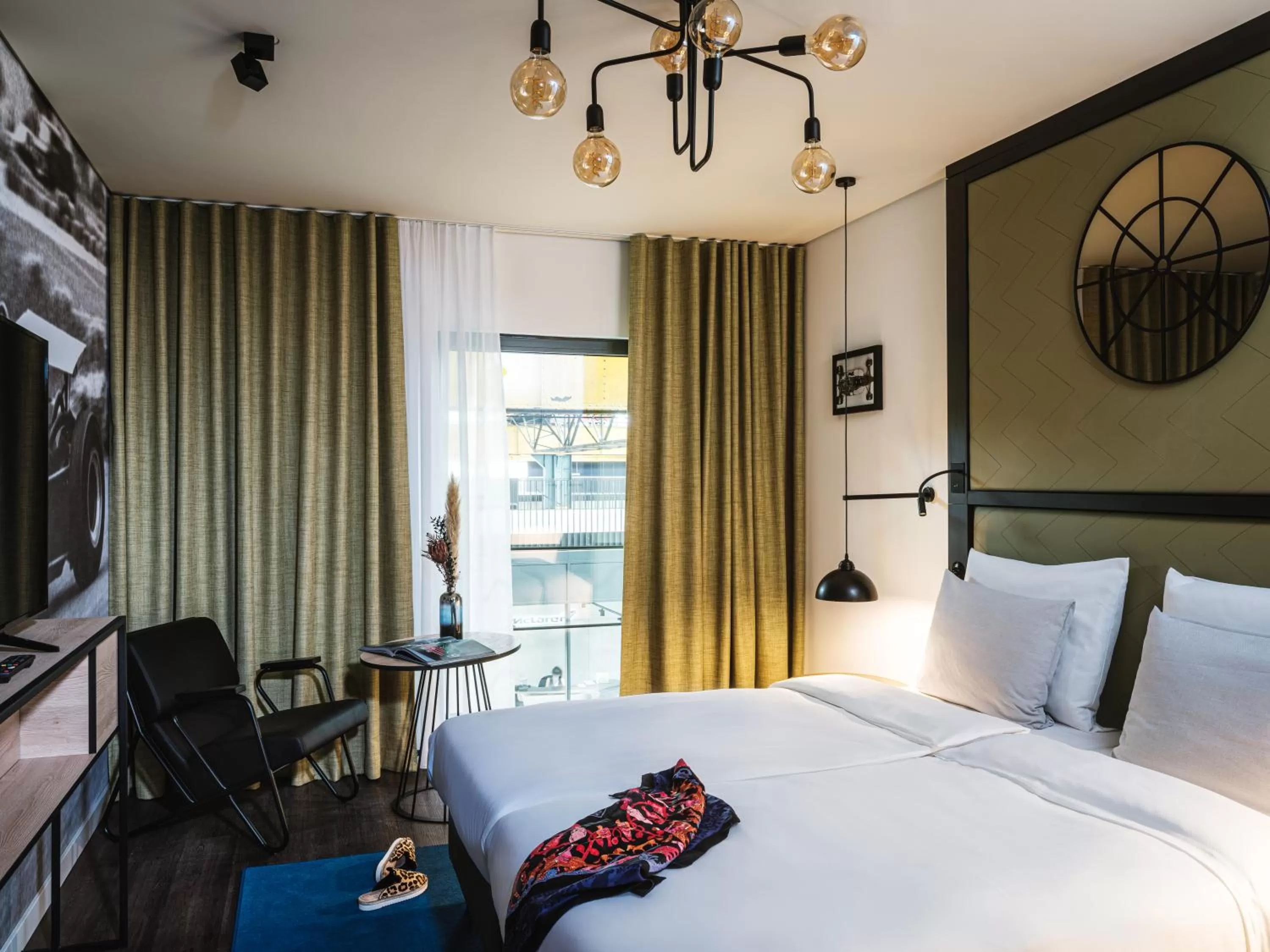 Photo of the whole room, Bed in AMERON München Motorworld