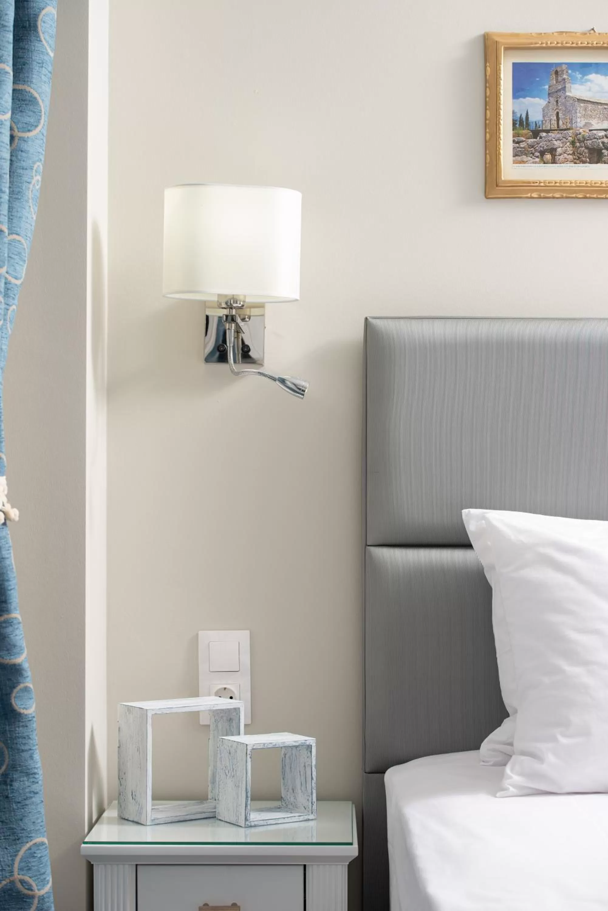 Bed in Light Blue Hotel