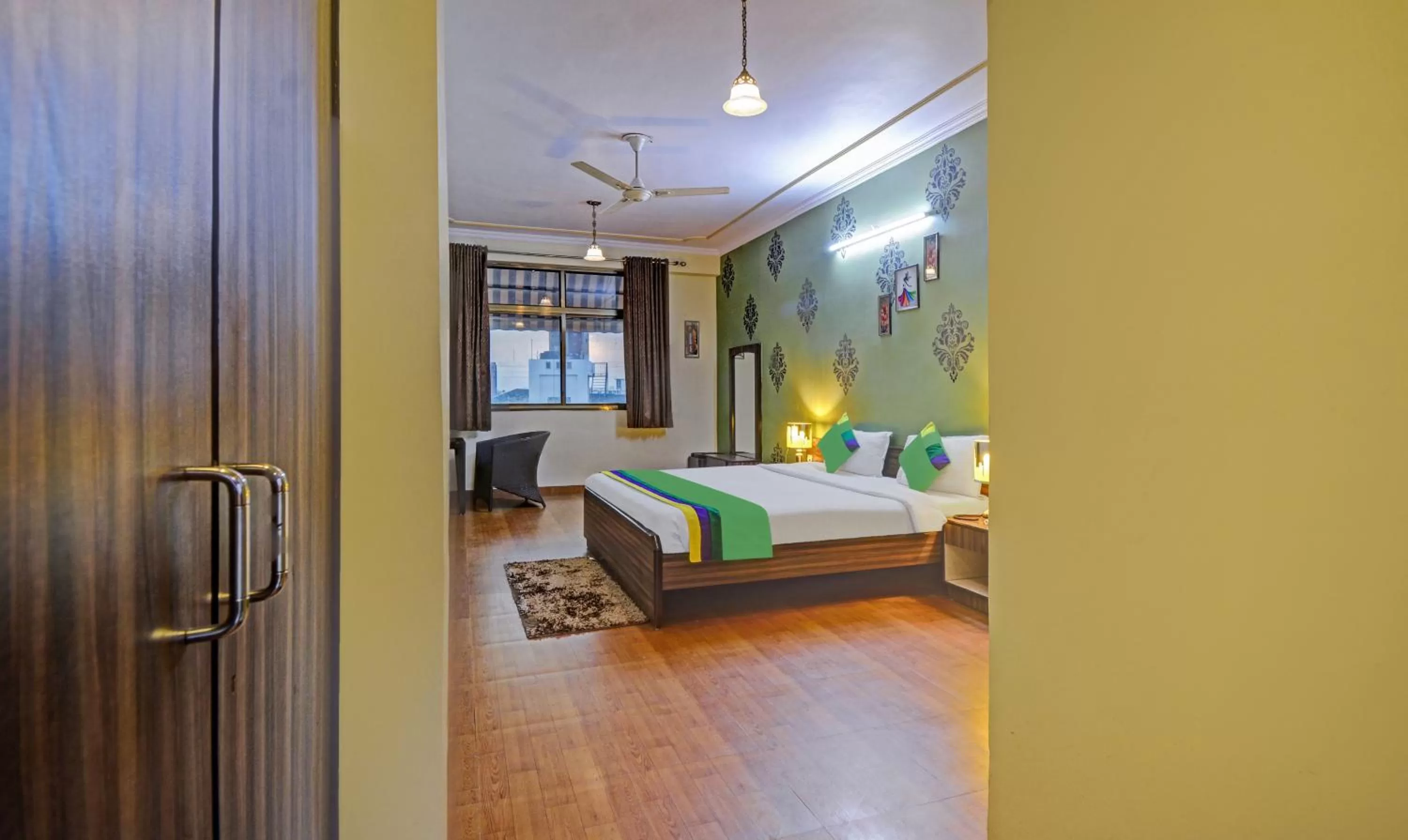 Bedroom, Bed in Treebo New Rockwell Vivek Vihar