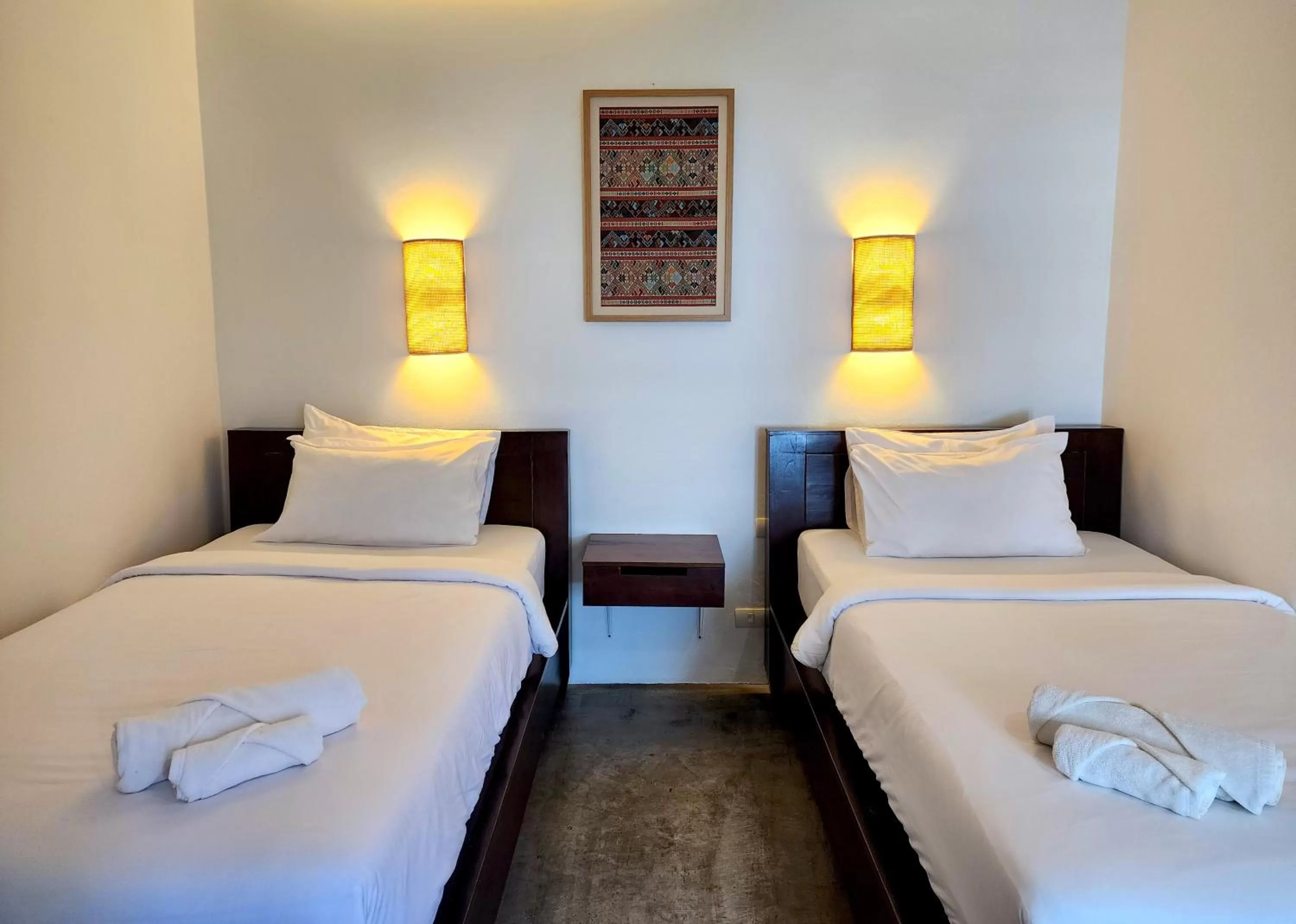 Bed in The Peaberry Boutique Hotel