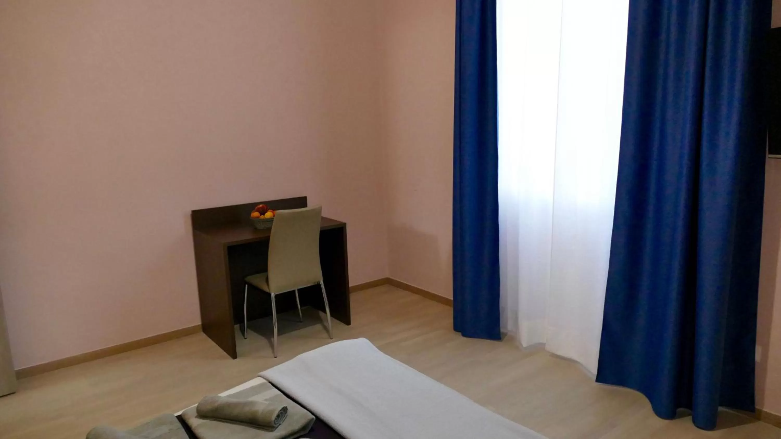 Photo of the whole room in Cairoli Exclusive Rooms & Suite