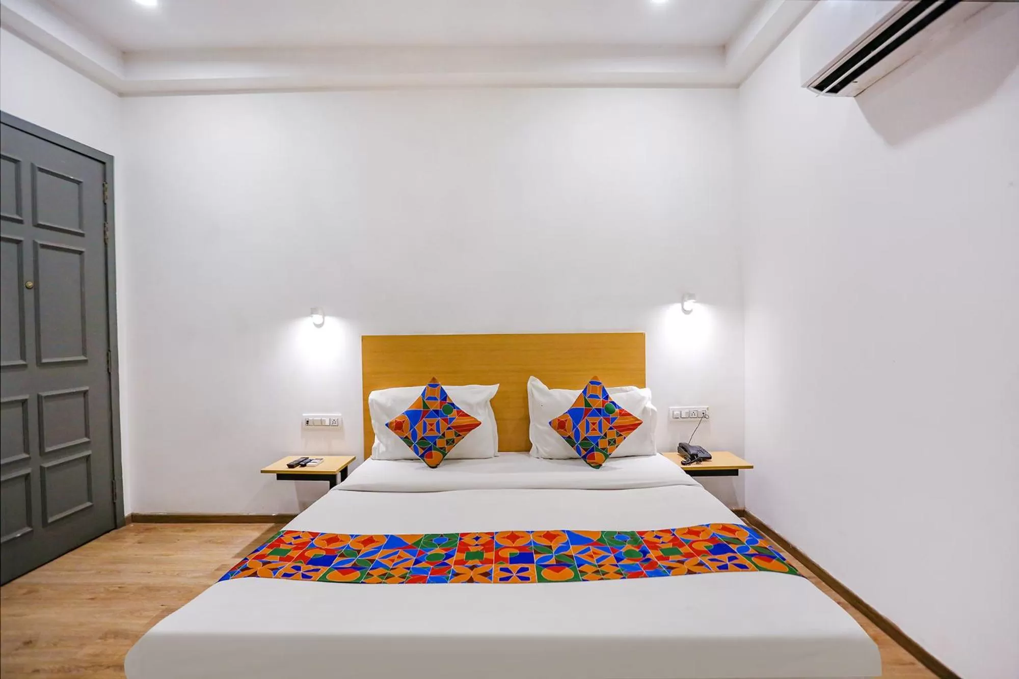 Bed in FabHotel Roseman